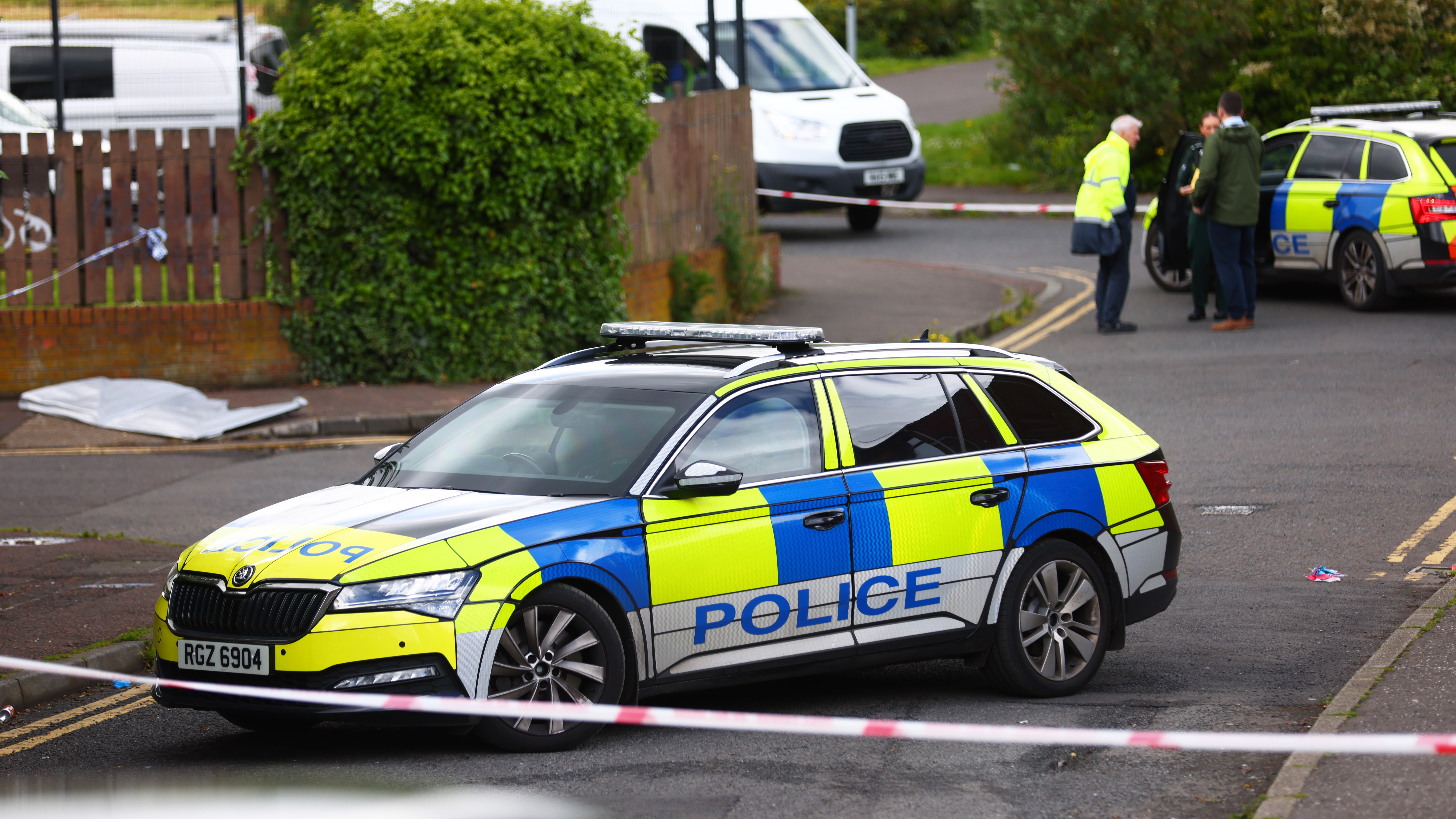 A police cordon at the scene of a stabbing outside apartments in north Belfast, Tuesday, June 3, 2026.