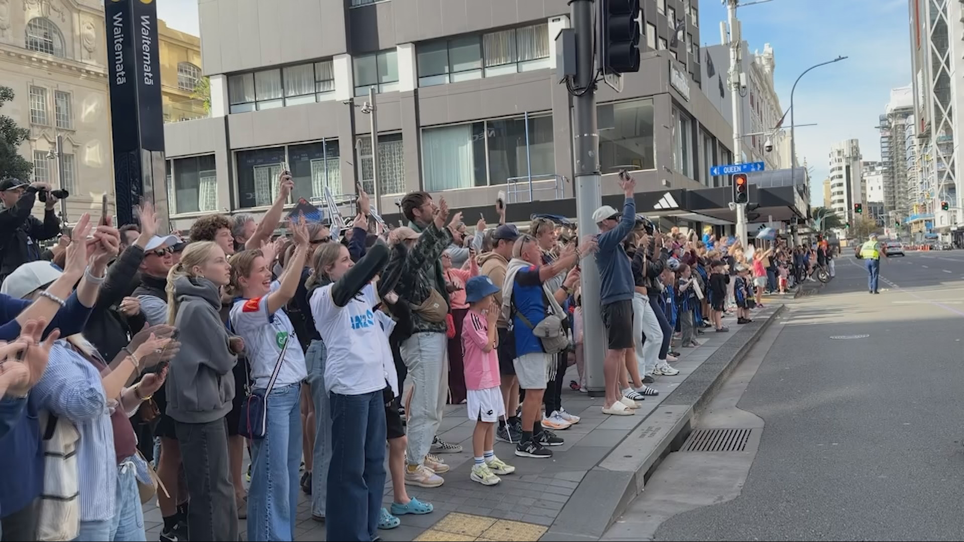 Fans line up in Commercial Bay to celebrate Auckland FC win.