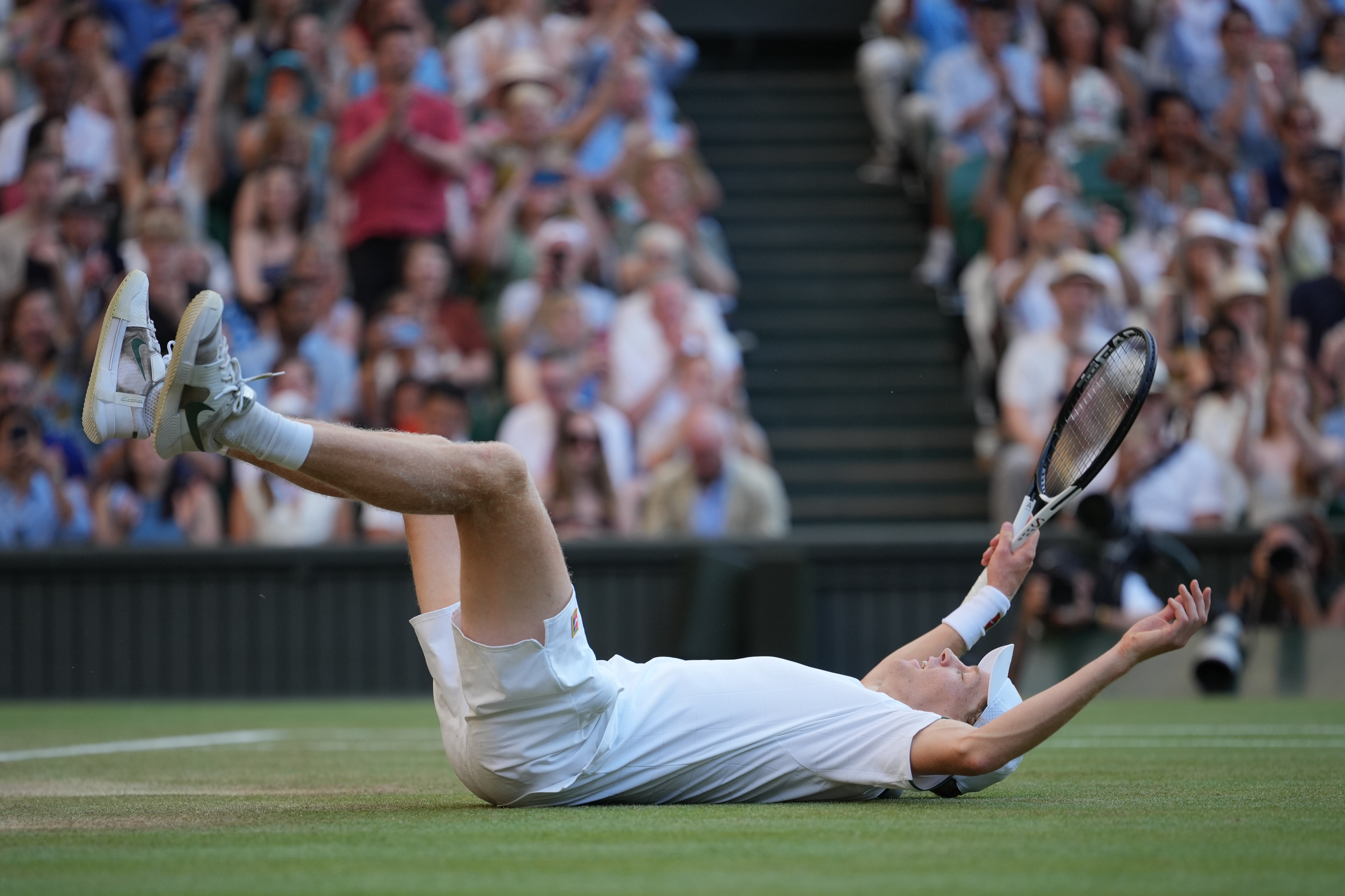 Jannik Sinner of Italy reacts after winning against Alexander Zverev of Germany in the men's singles final at Wimbledon Tennis Championships in London.