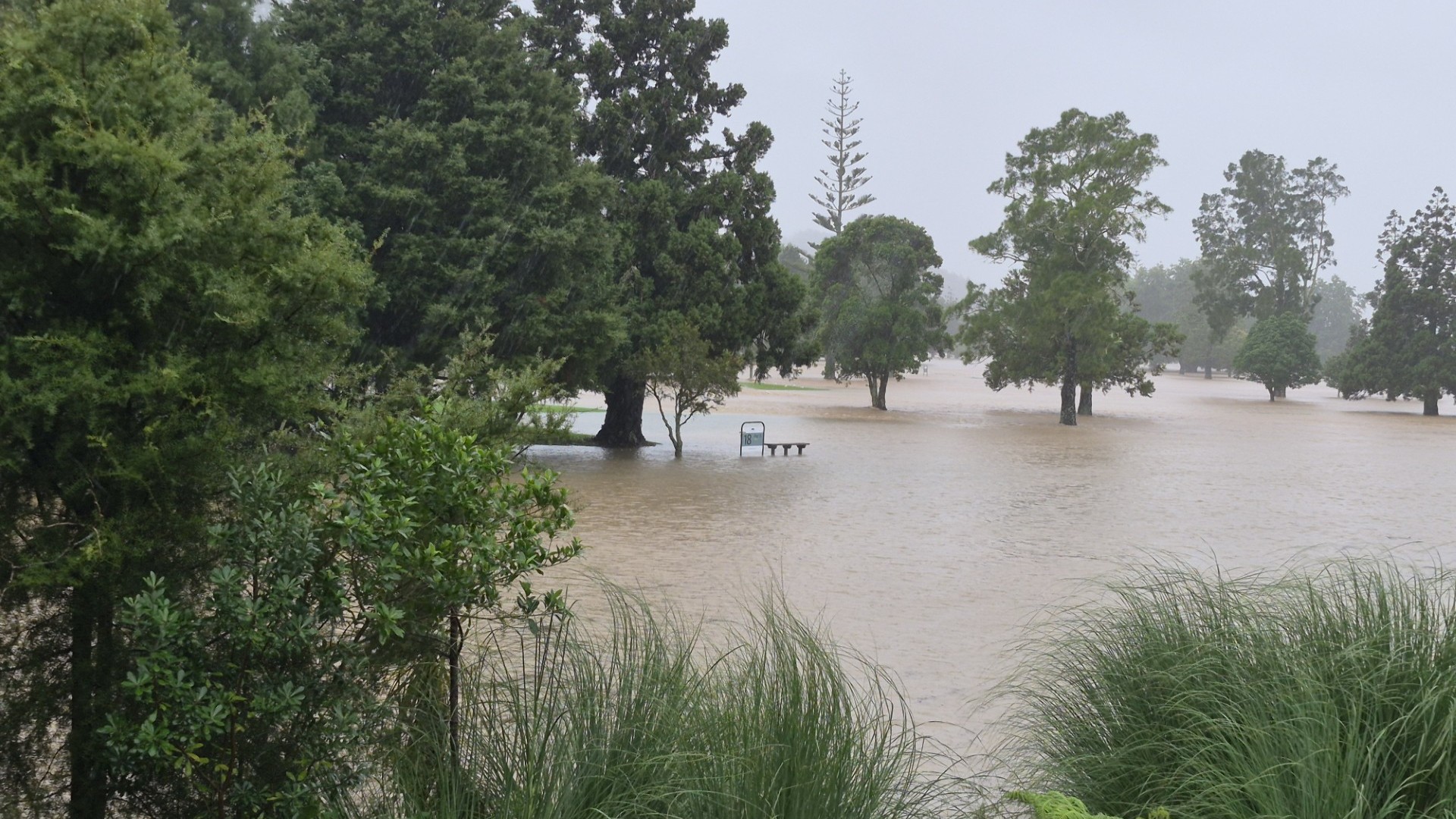 Whangamatā Golf Course under floodwater.