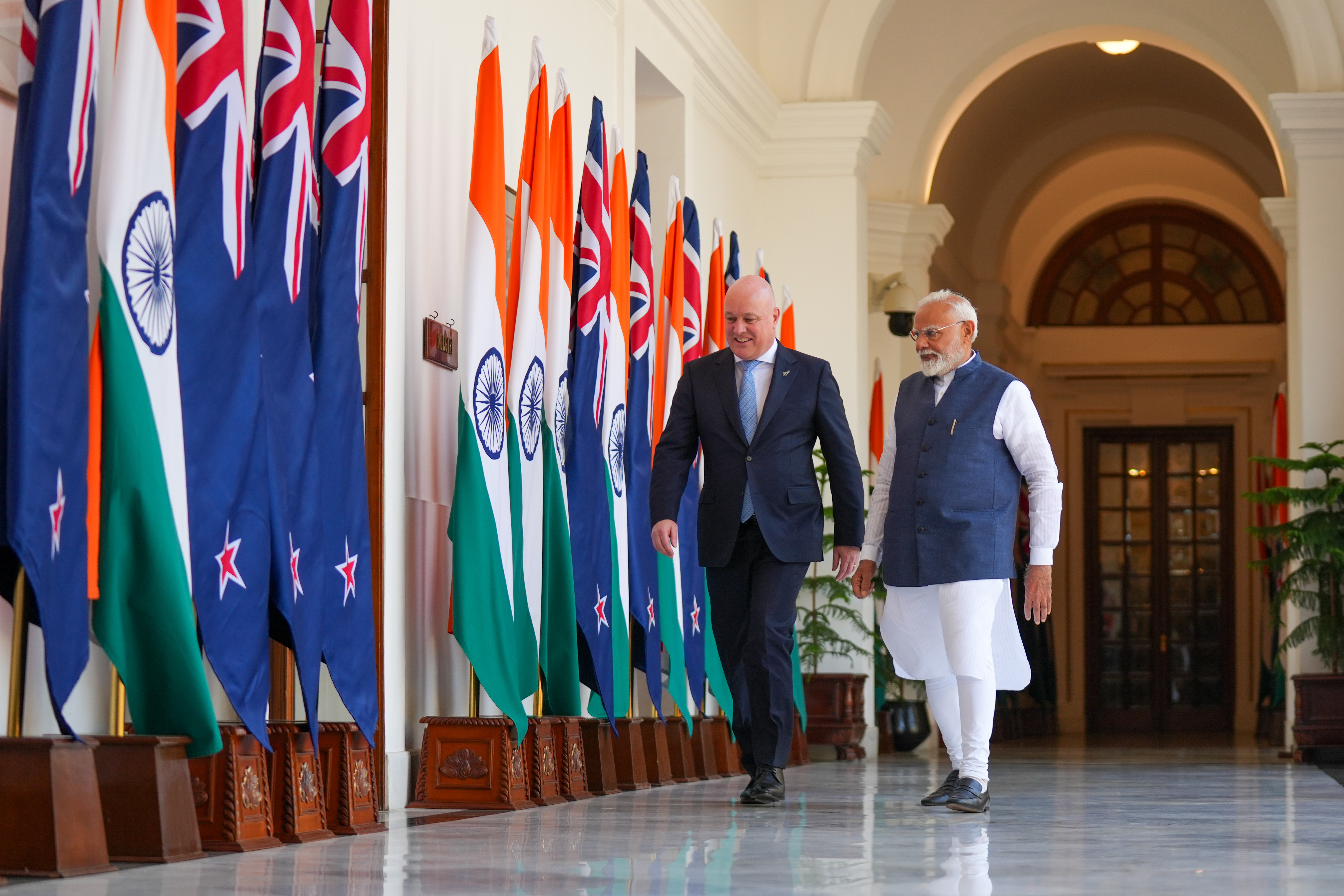 New Zealand Prime Minister Christopher Luxon and India Prime Minister Narendra Modi in India in March 2025 when negotiations were launched. 