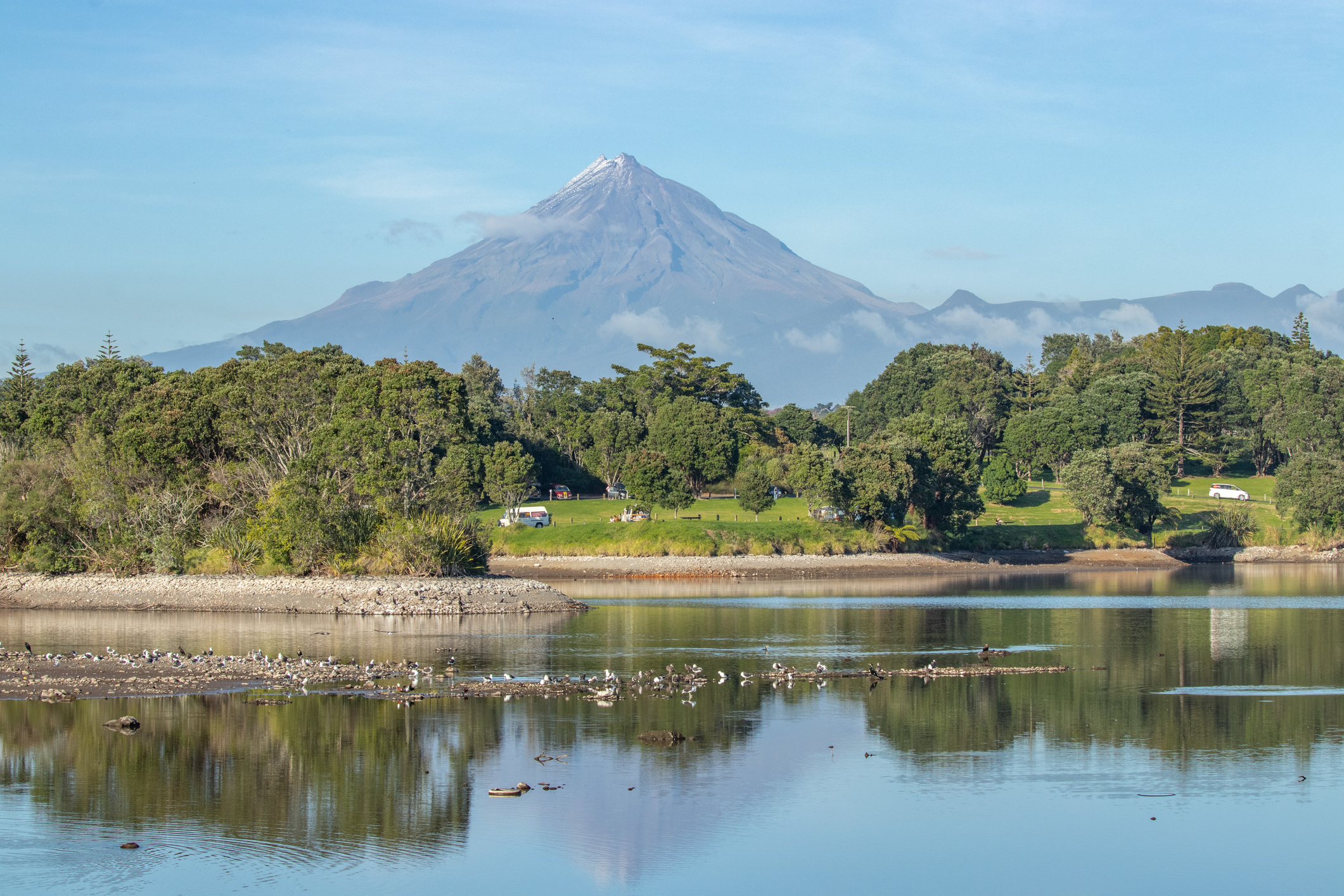 A freedom camping site in New Plymouth with Mt Taranaki in the background.