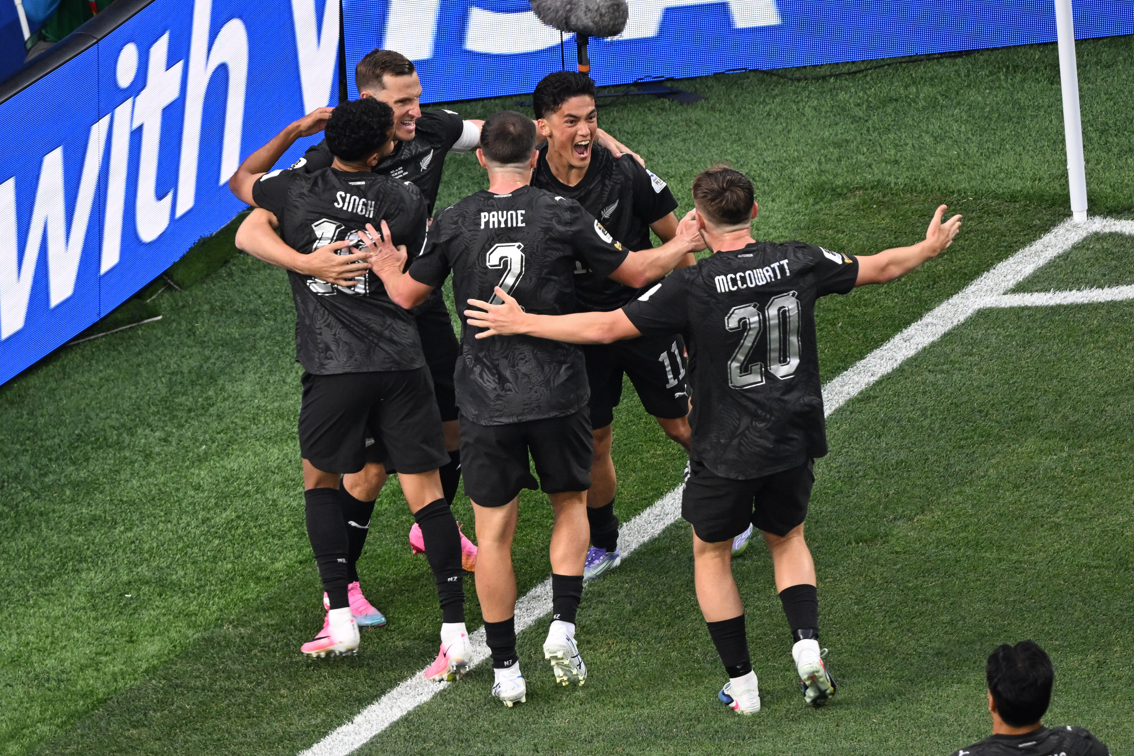 The All Whites celebrate scoring against Iran in their World Cup opener.