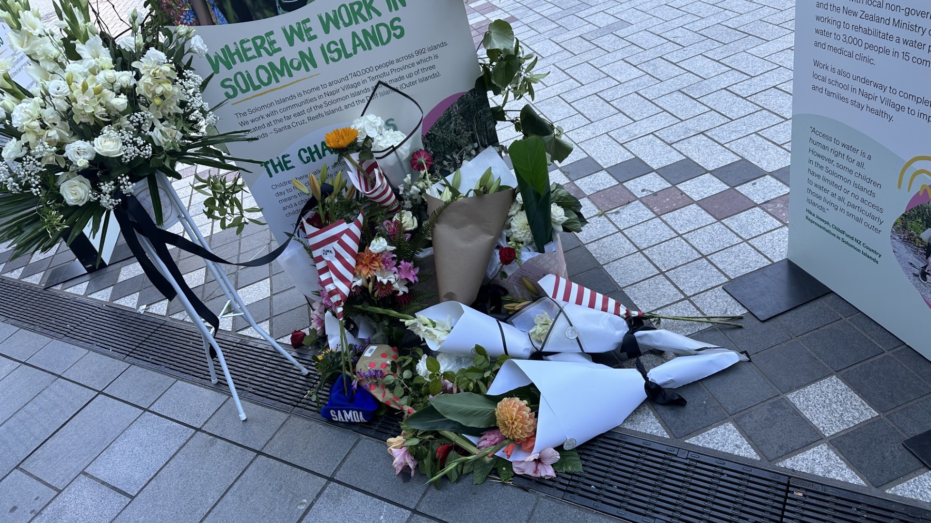 Floral tributes left at Britomart for Efeso Collins.