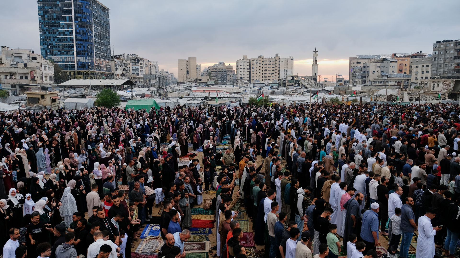 Muslims worshipers gather for Eid al-Adha prayers in Gaza City.