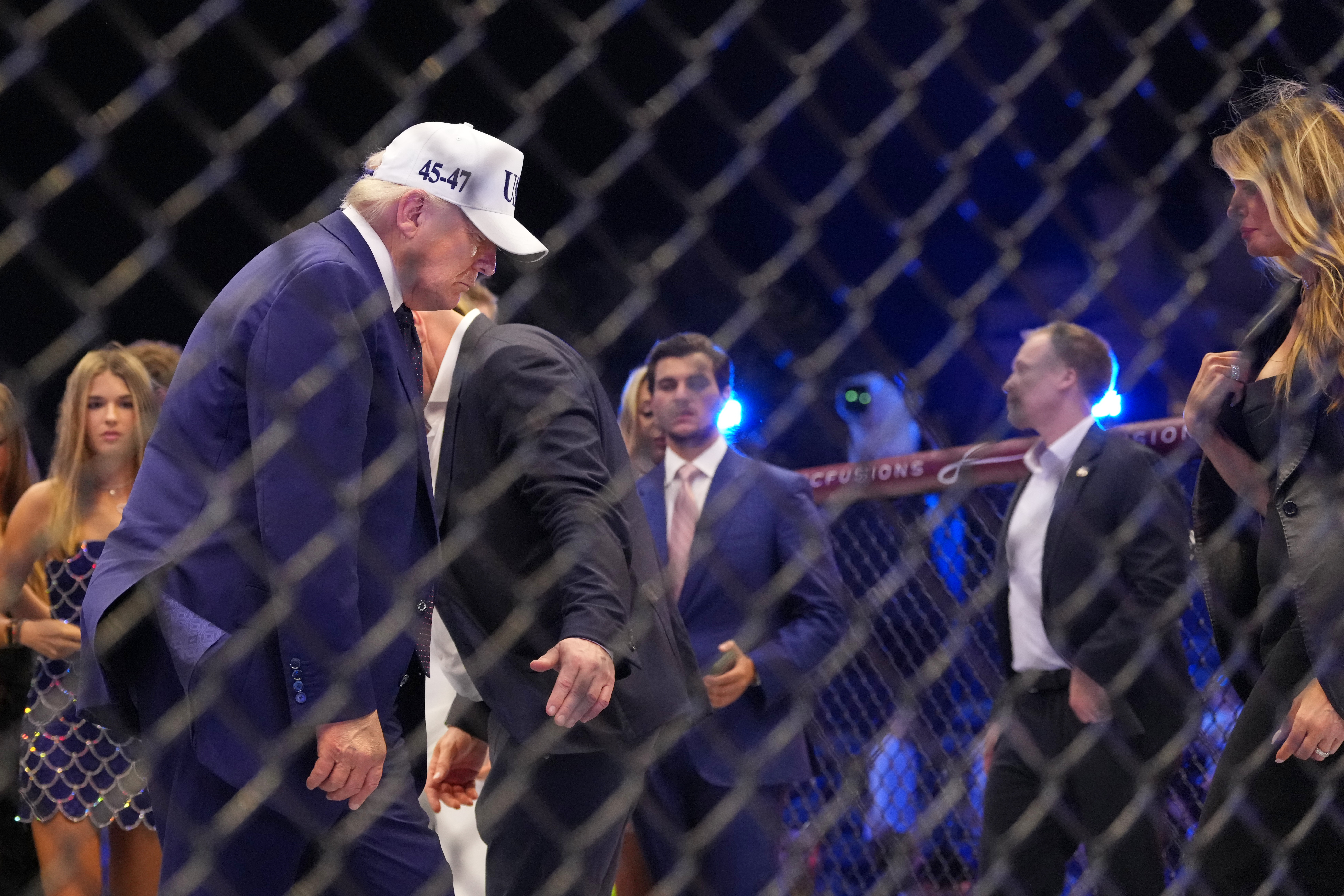 President Donald Trump and first lady Melania Trump stand in the ring at UFC Freedom 250 on the South Lawn of the White House, Monday, June 15, 2026, in Washington.