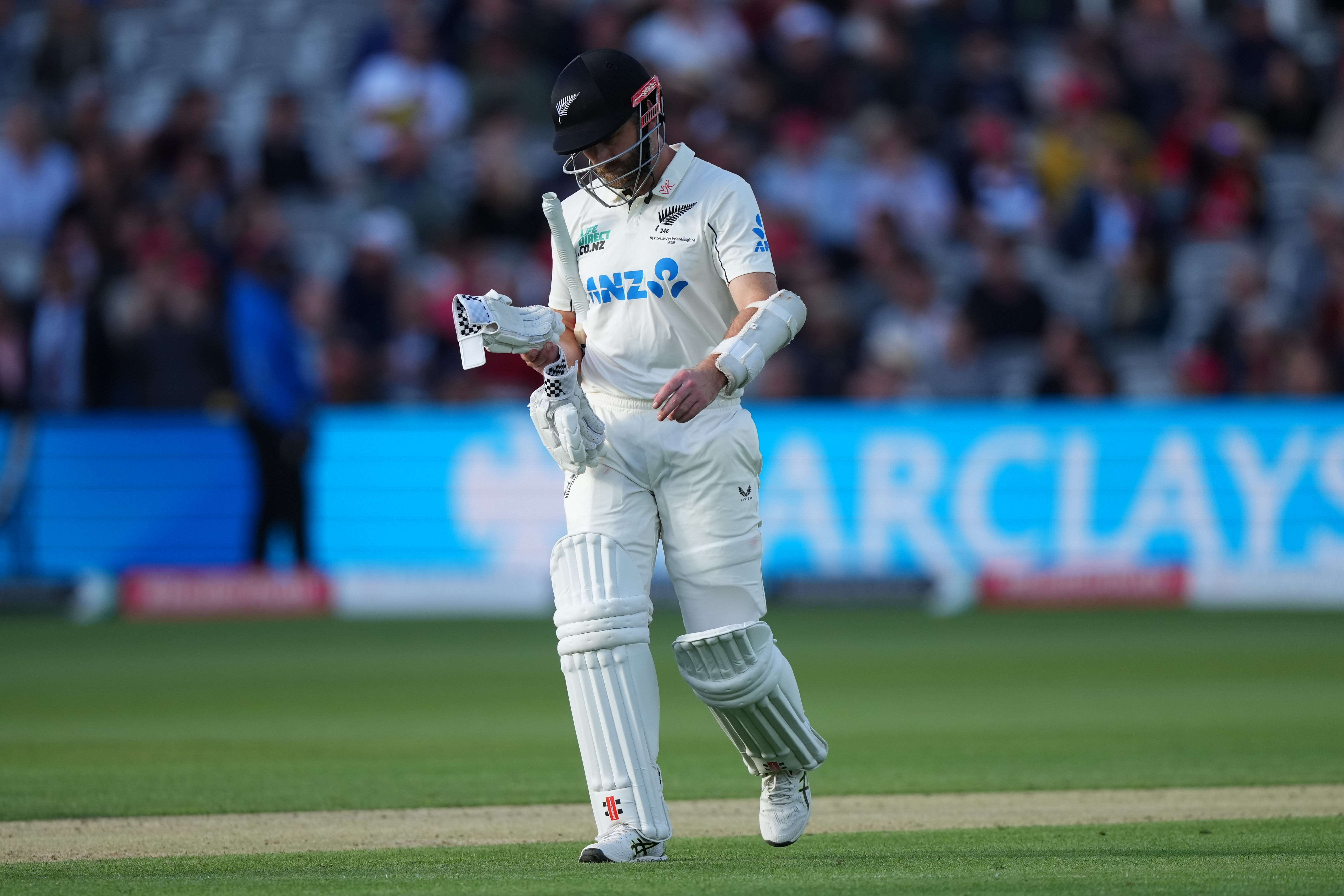 New Zealand's Kane Williamson leaves the pitch after losing his wicket during the second day of the test match between England and New Zealand at Lord's cricket ground in London, Friday, June 5, 2026. 