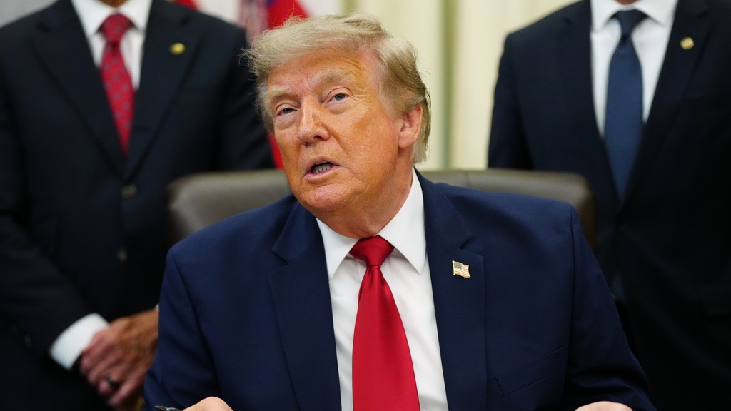 US President Donald Trump speaks in the Oval Office of the White House, Monday, July 13, 2026, in Washington, as he signs executive orders.