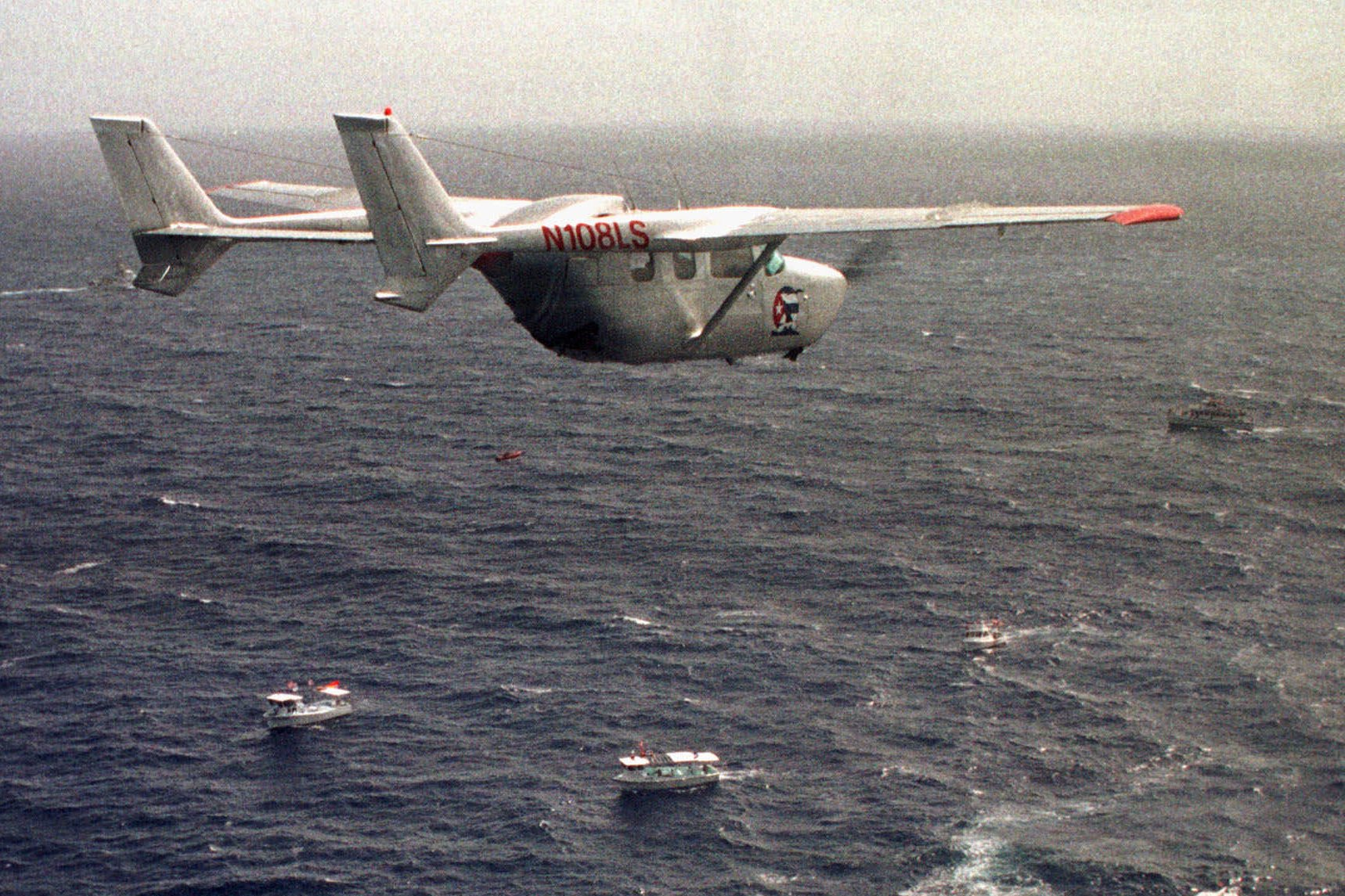 A Brothers to the Rescue plane flies over the north of Havana, Cuba, July 10, 1999.