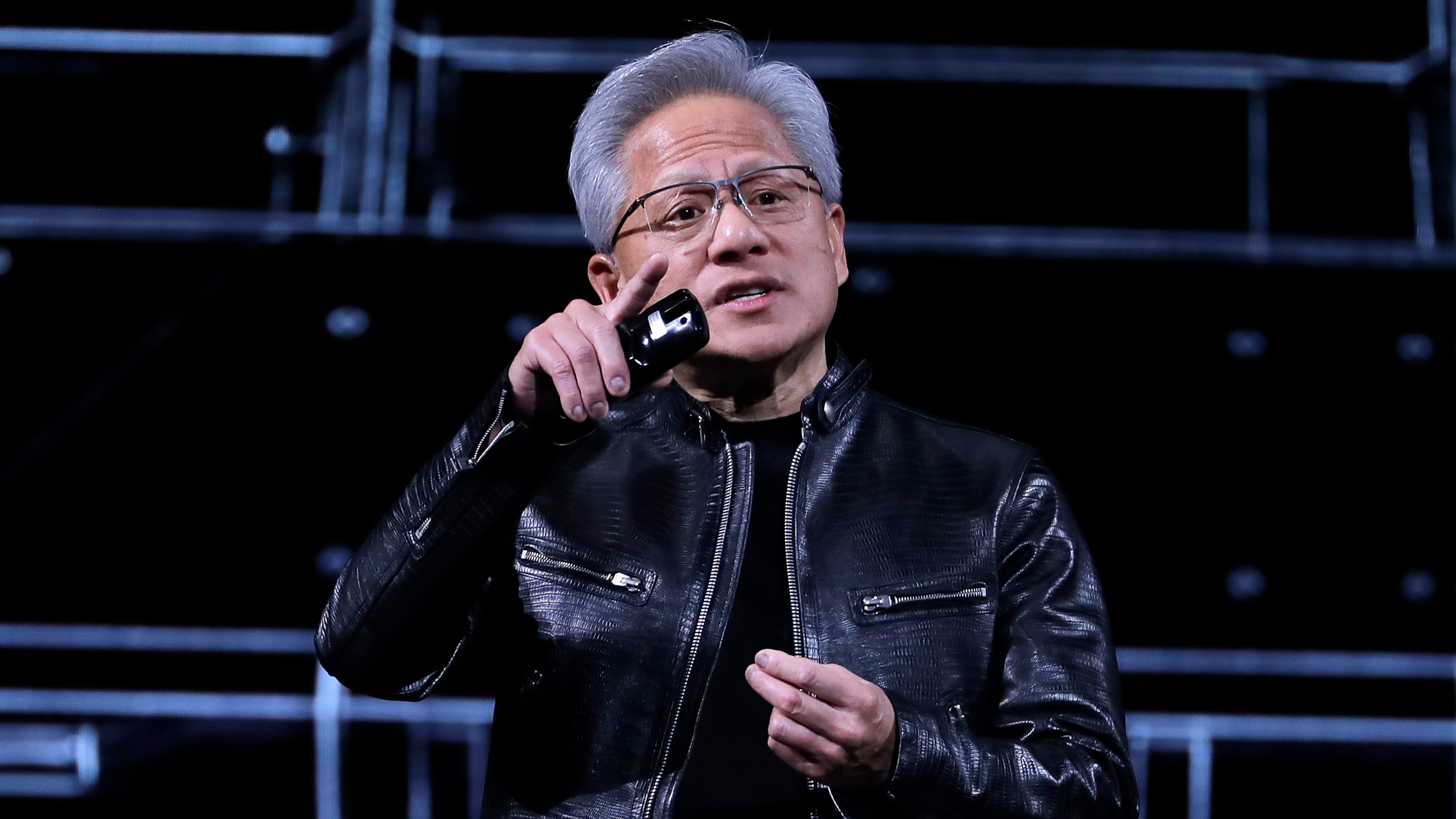 Nvidia CEO Jensen Huang delivers a speech during the Computex 2026 exhibition in Taipei, Taiwan, Monday, June 1, 2026.