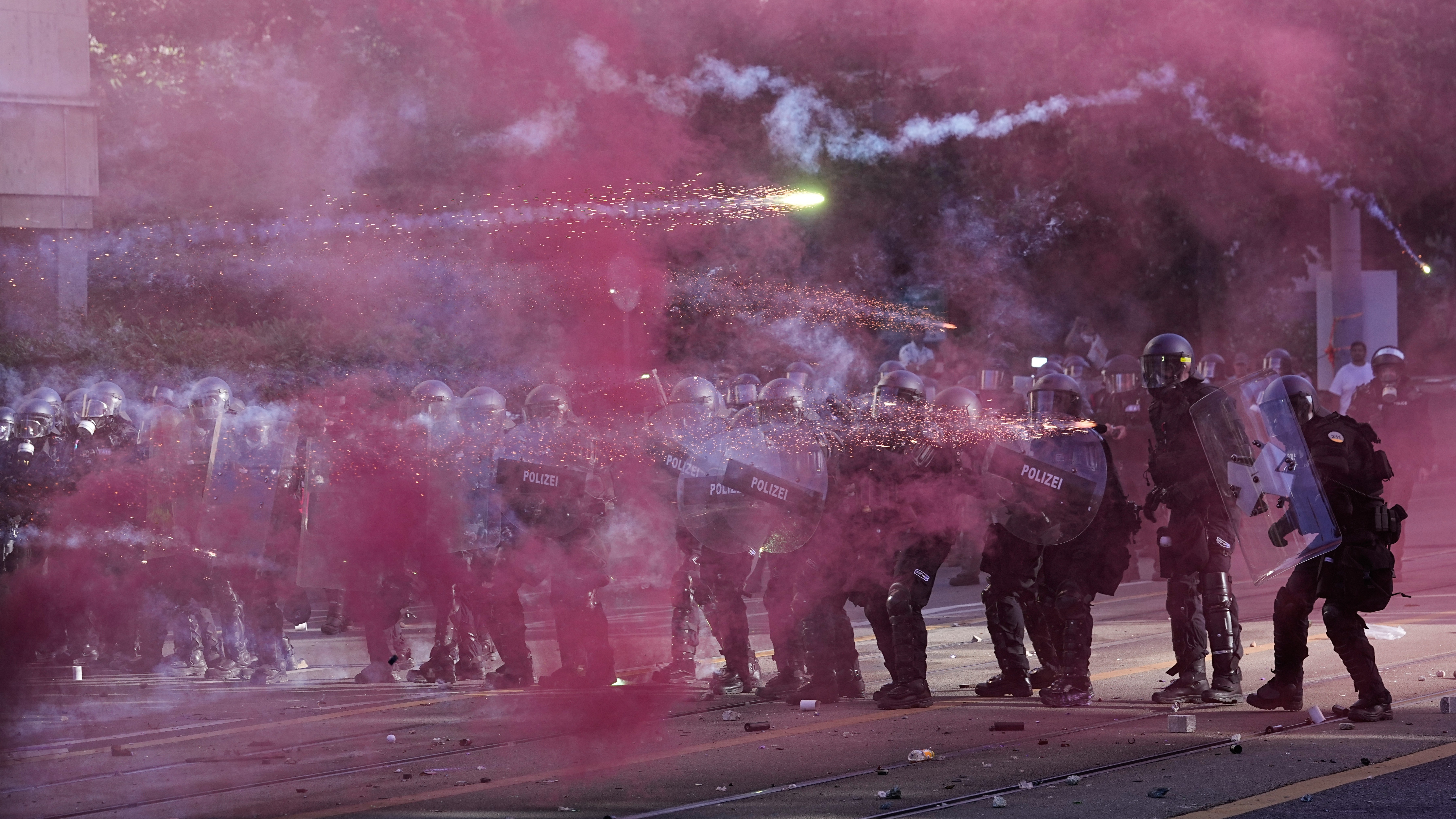 Protestors clash with police in Geneva ahead of the G7 summit in nearby France.