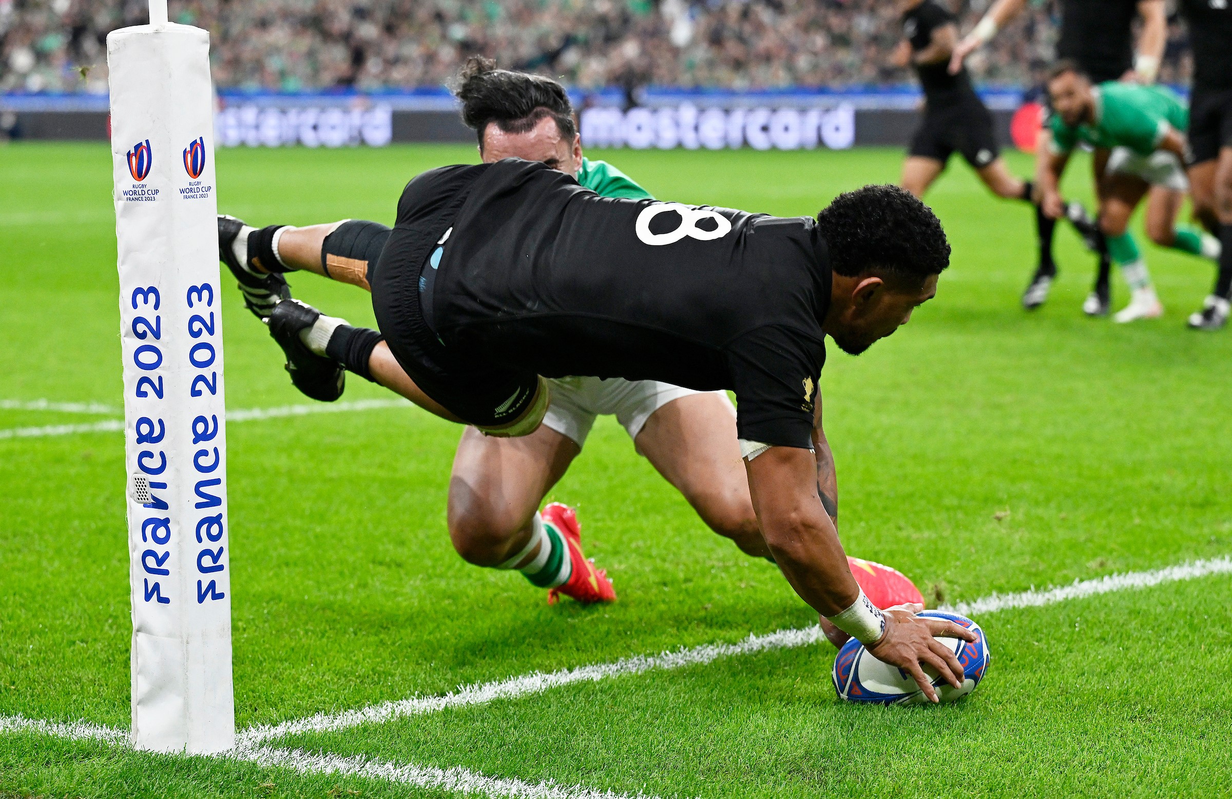 Ardie Savea goes over in the corner for the All Blacks against Ireland. 
