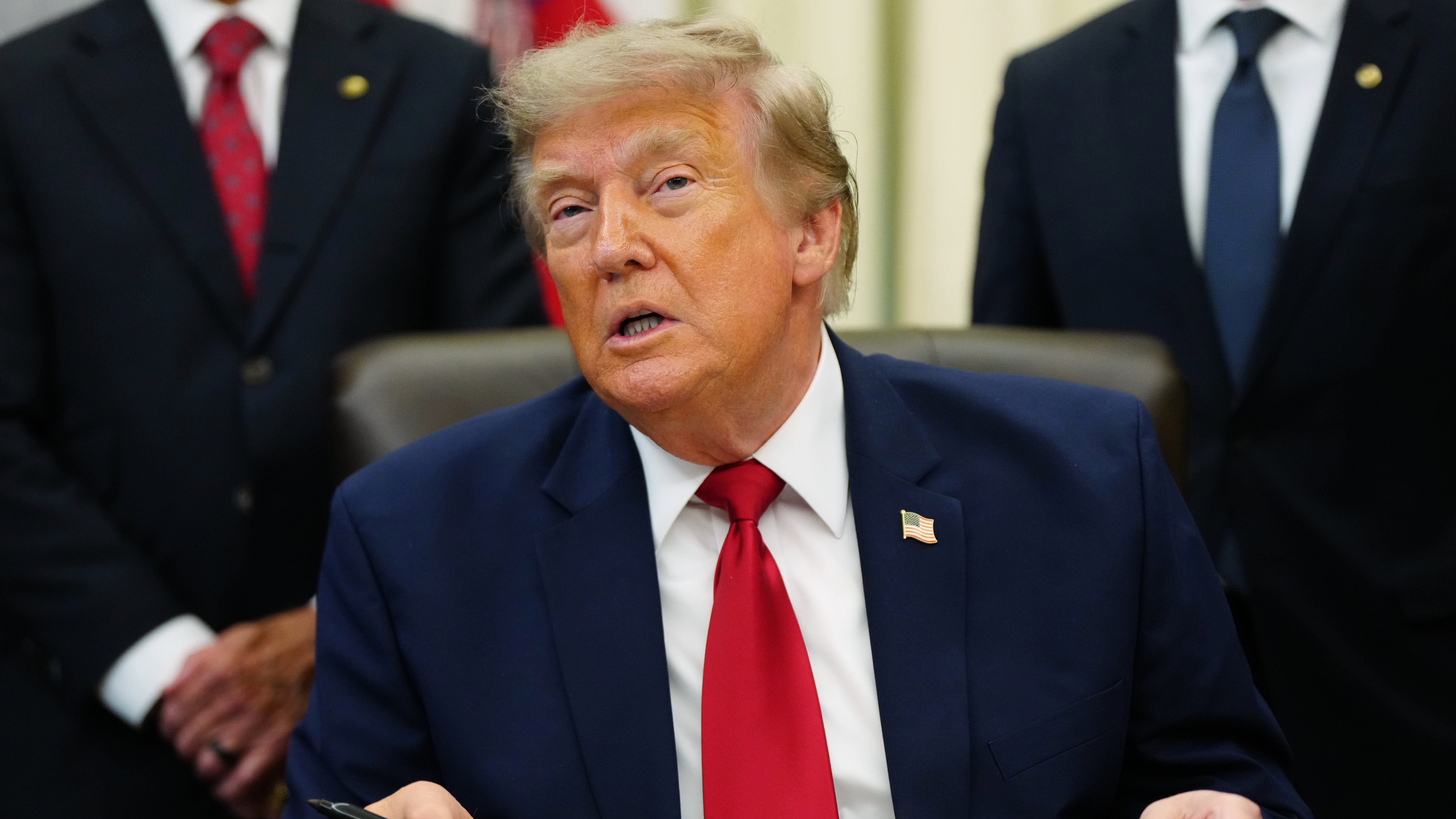 President Donald Trump speaks in the Oval Office of the White House, Monday, July 13, 2026, in Washington, as he signs executive orders.