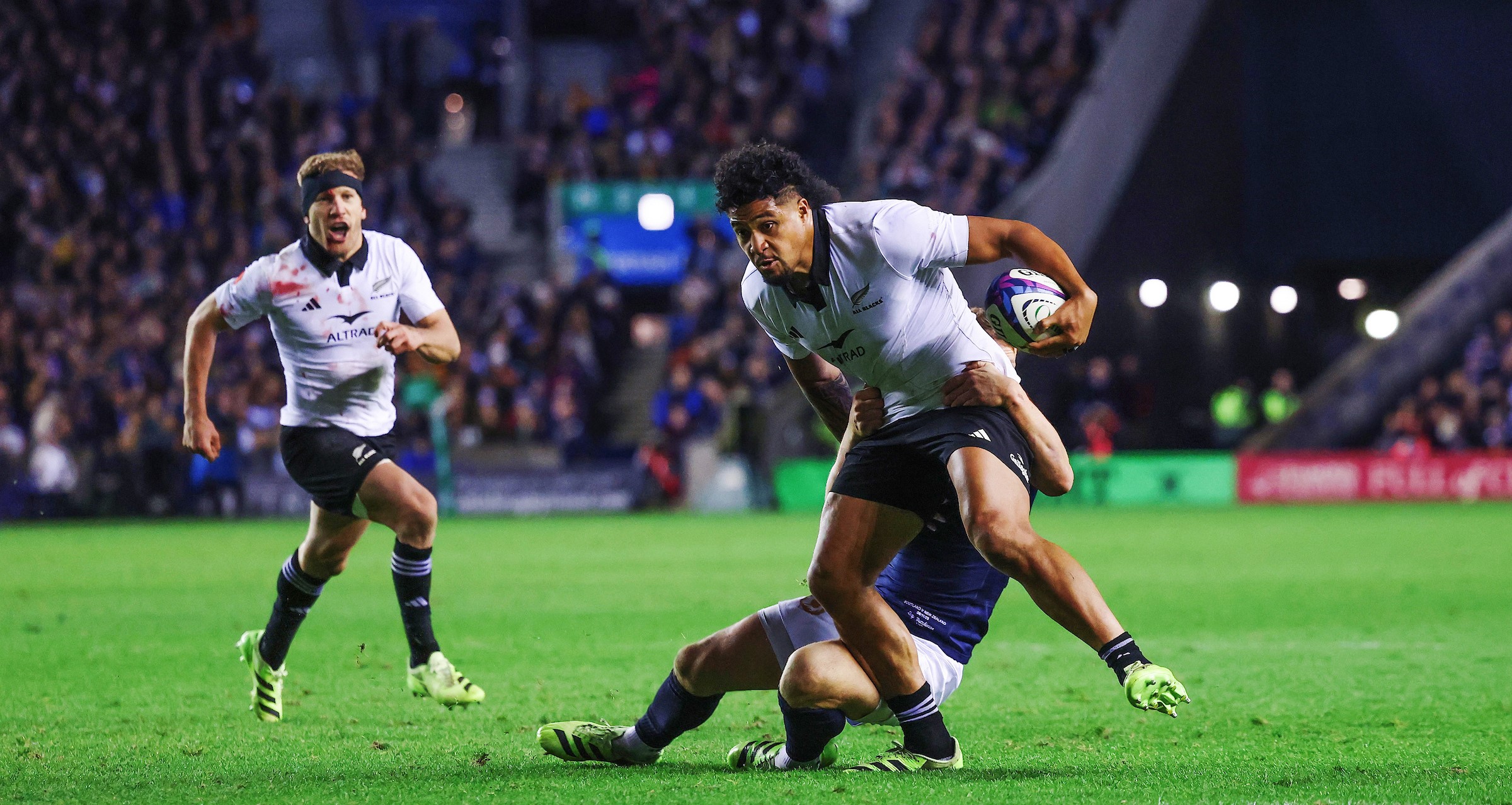 Leicester Fainga'anuku gets close to the line in the build-up to Damian McKenzie's try against Scotland.