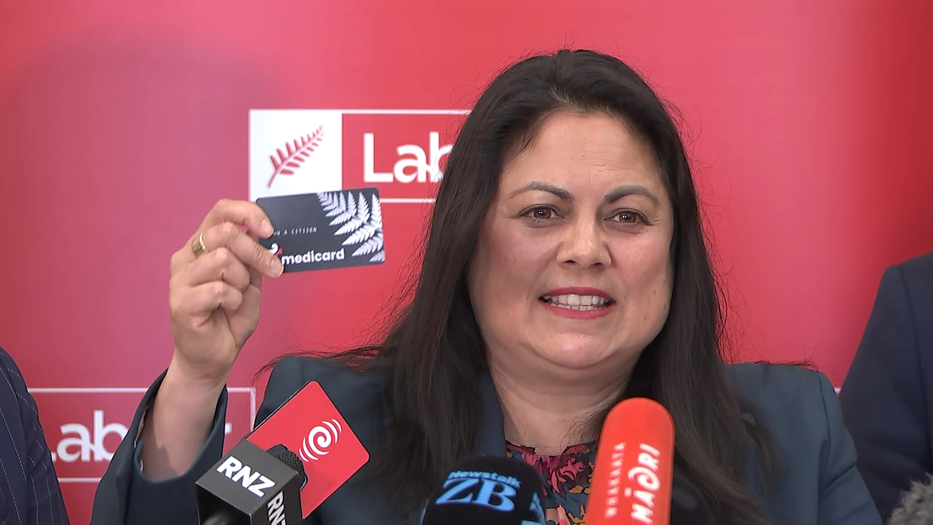 Labour health spokesperson Ayesha Verrall holds up the Medicard.