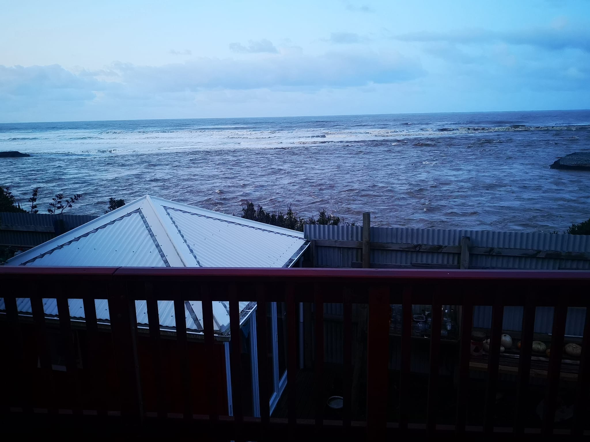 Waiau river mouth reaching a Tuatapere resident's house.  