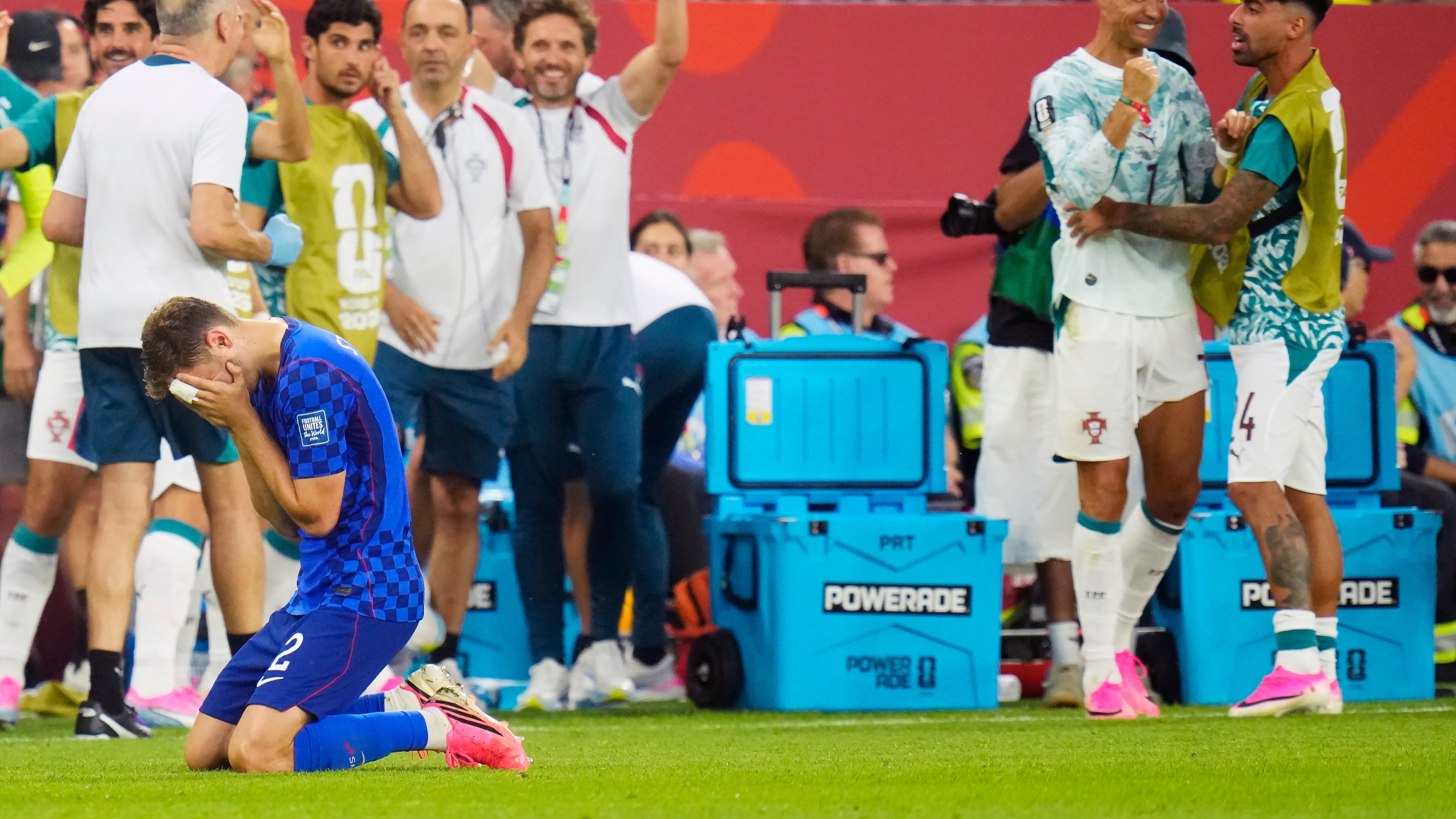 Croatia's Josip Stanisic (2) reacts as a goal is disallowed as Portugal's Cristiano Ronaldo, second right, celebrates during the second half of a World Cup round of 32 soccer match, in Toronto on Thursday, July 2, 2026.