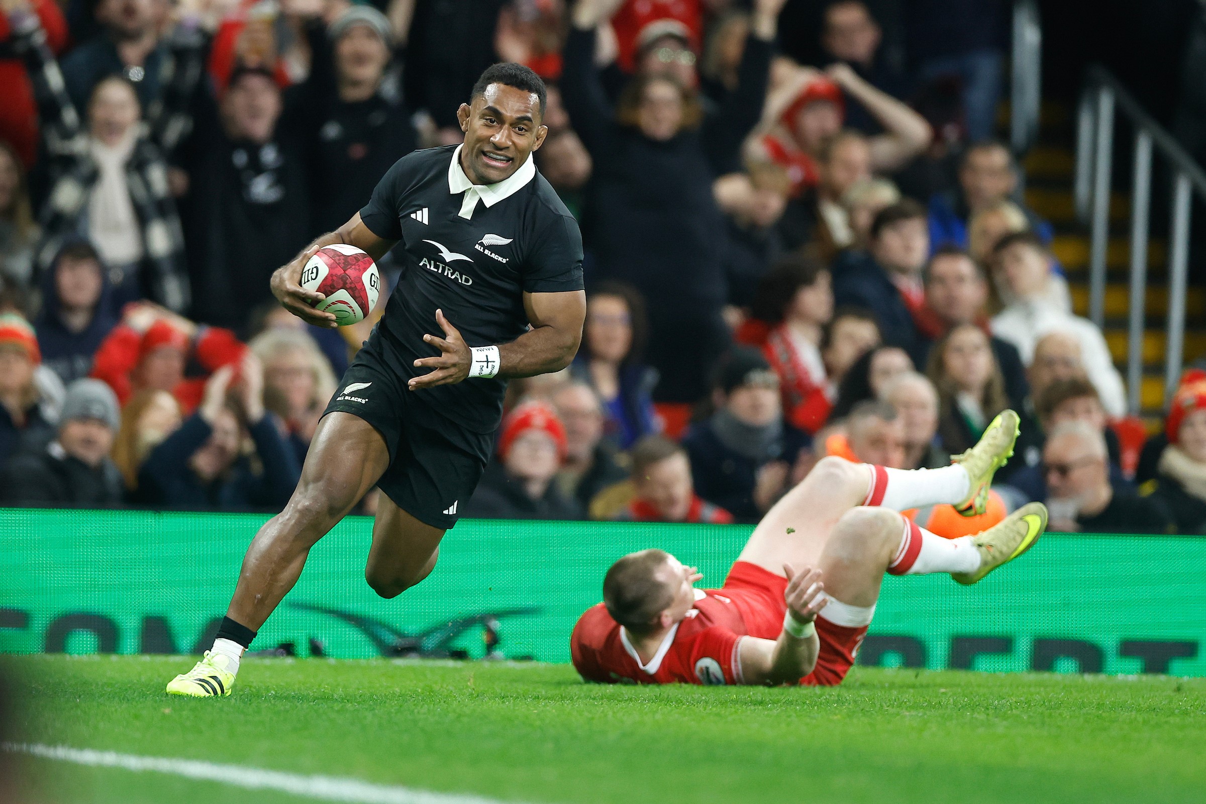 Wing Sevu Reece goes over for one of his two tries against Wales.