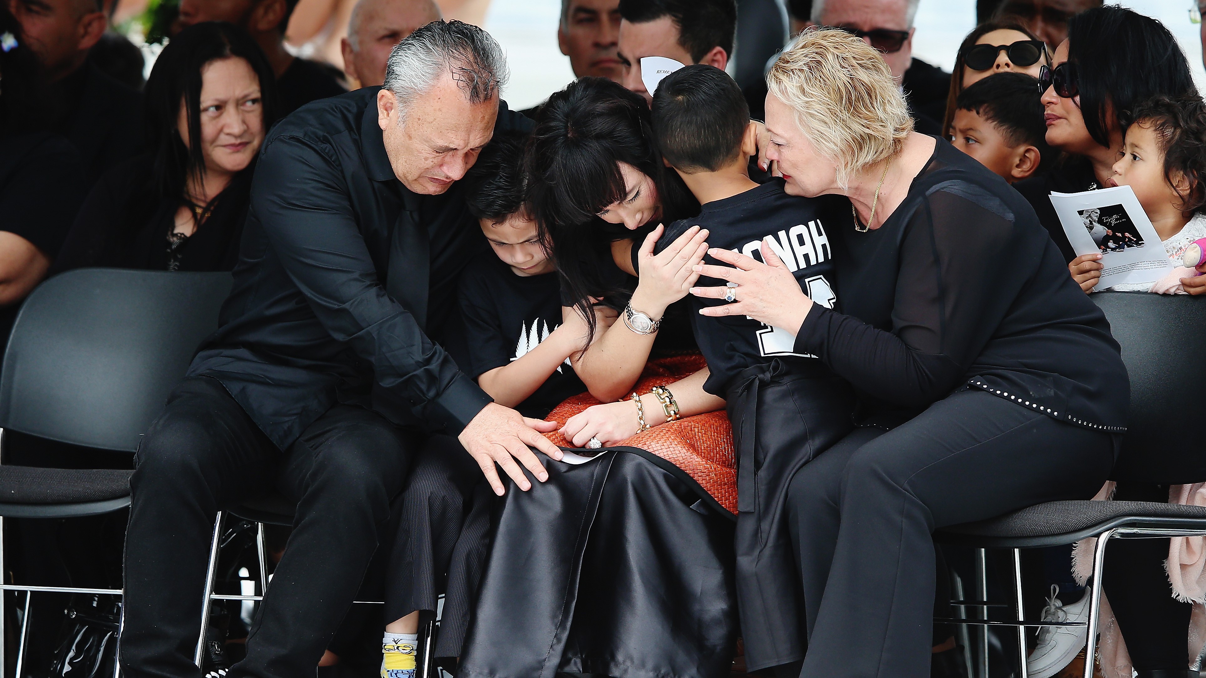  Nadene Lomu with Brayley and Dhyreille and her parents at a public memorial for Jonah at Eden Park, November 30, 2015. (Photo by Hannah Peters)