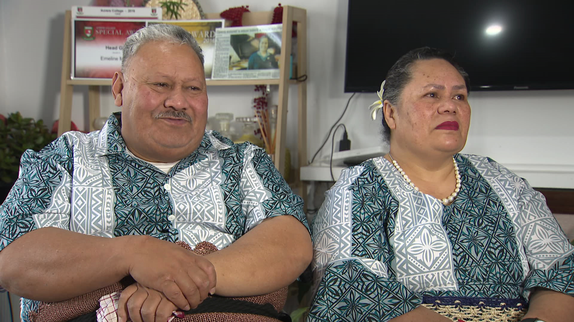 Puipui (left) and his wife Amelia will never miss an opportunity to speak of their pride in their family.