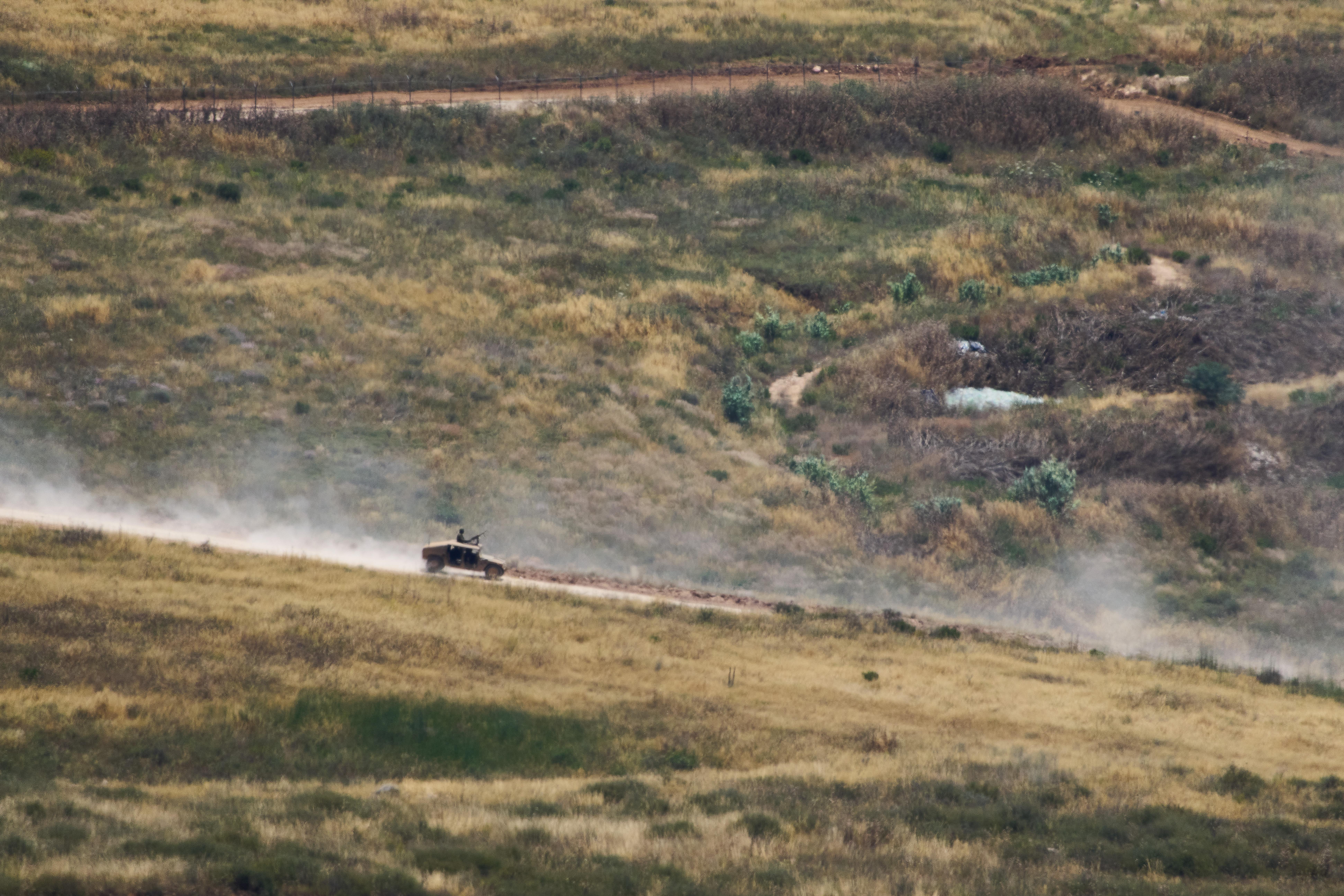 Israeli soldiers drive in southern Lebanon as seen from northern Israel, Thursday June 4, 2026.