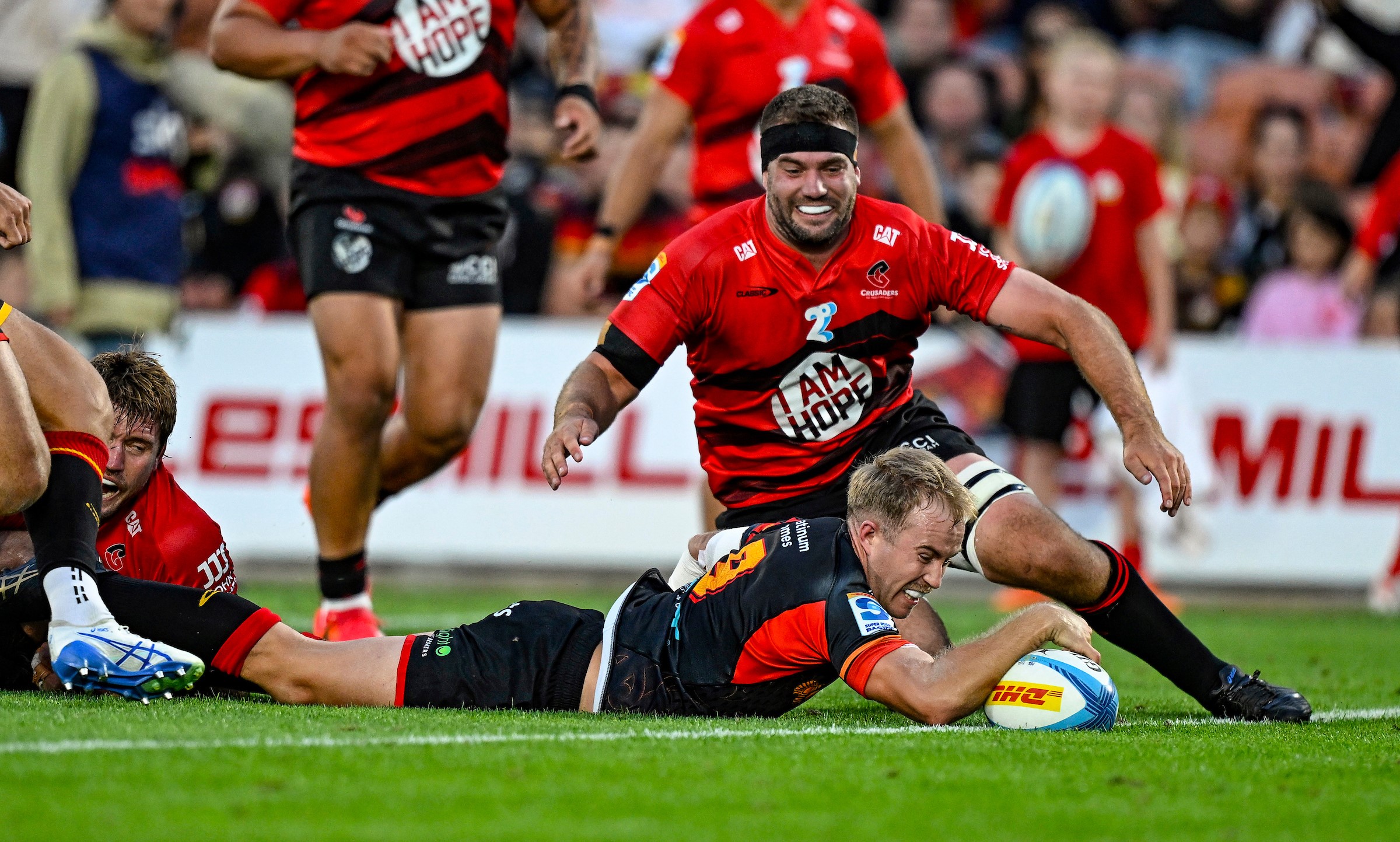 Chiefs halfback Xavier Roe scores his first-half try against the Crusaders.