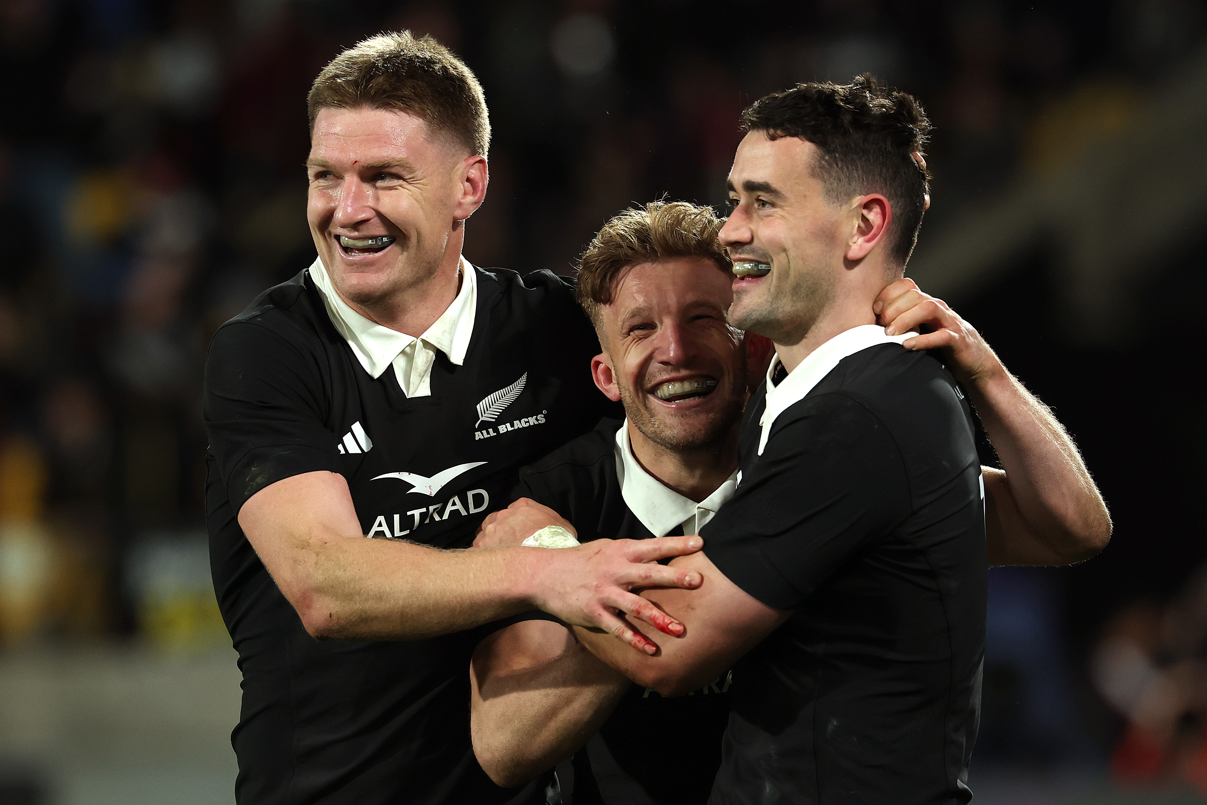 WELLINGTON, NEW ZEALAND - JULY 11: Will Jordan of New Zealand celebrates scoring his team's fifth try with Damian McKenzie of New Zealand and Jordie Barrett of New Zealand during the Nations Championship match between New Zealand All Blacks and Italy at Hnry Stadium on July 11, 2026 in Wellington, New Zealand. (Photo by Morgan Hancock - Nations Championship/Nations Championship via Getty Images)