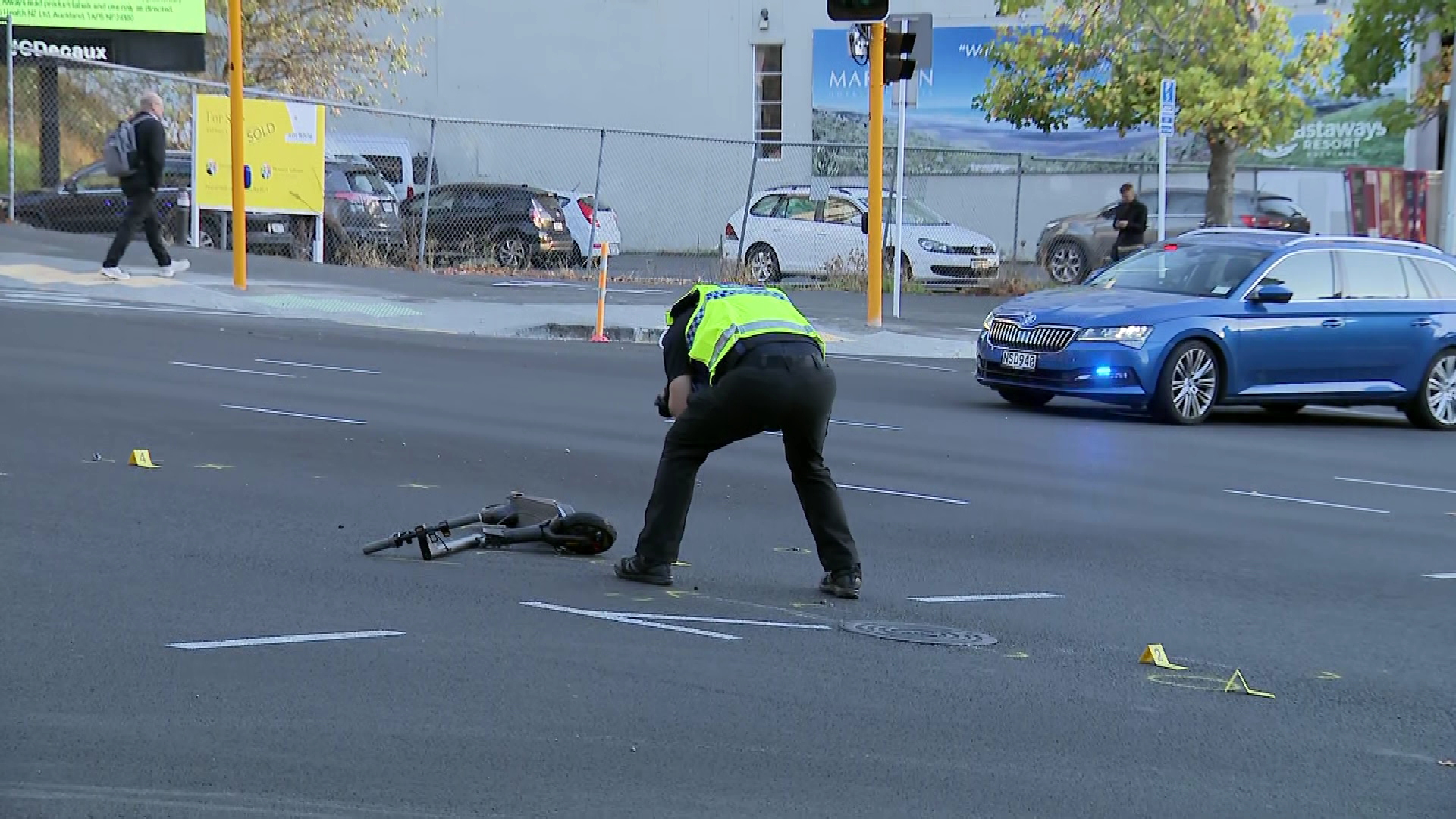 Police at the scene of a scooter crash in central Auckland.