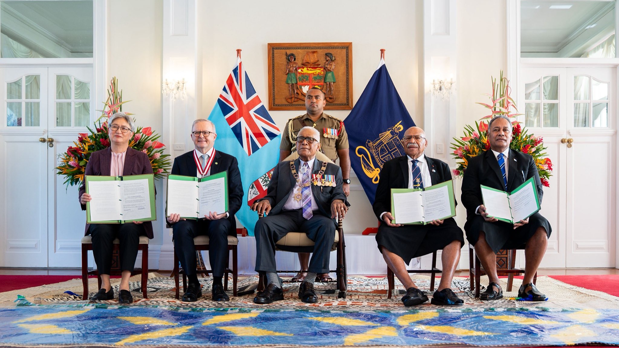 Australia and Fiji leaders at the signing of the Ocean of Peace defence alliance.