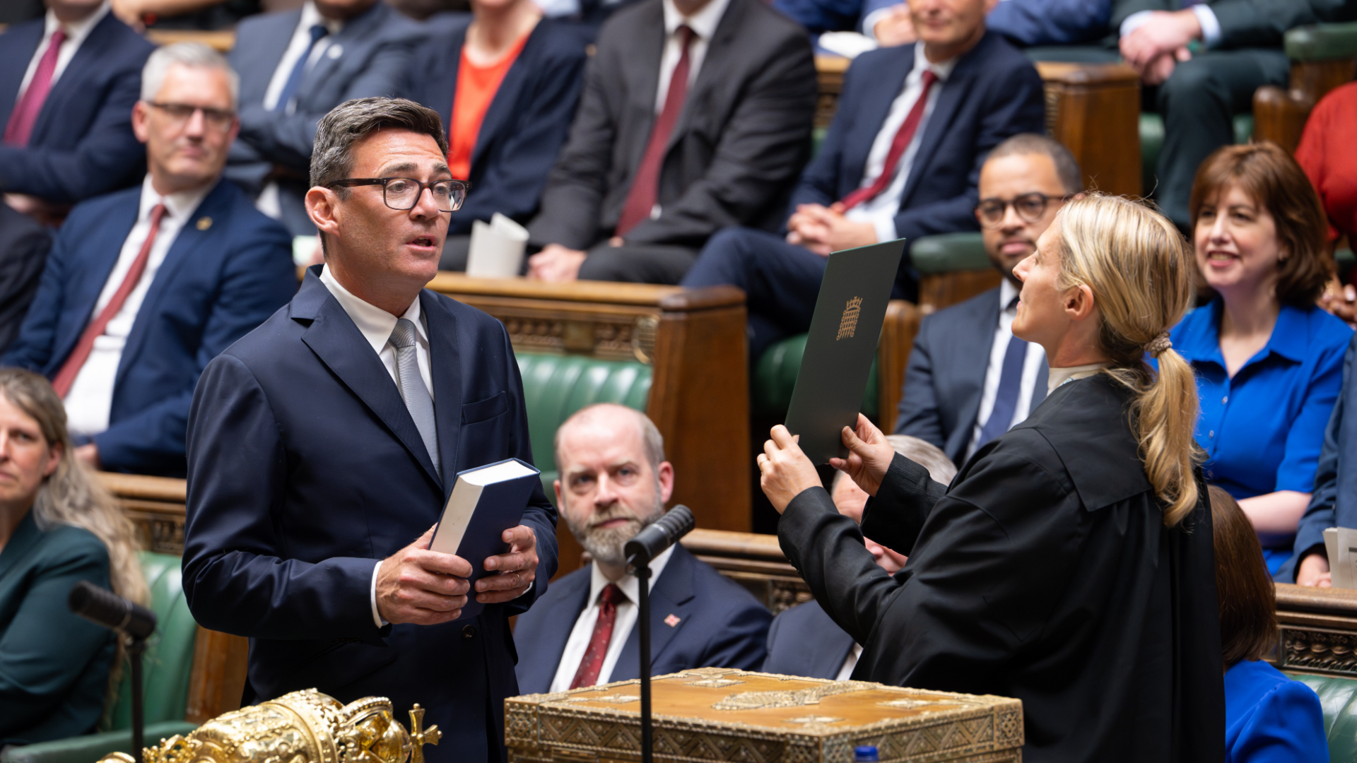 Andy Burnham, front left, is sworn-in as an MP in the House of Common in London, England.