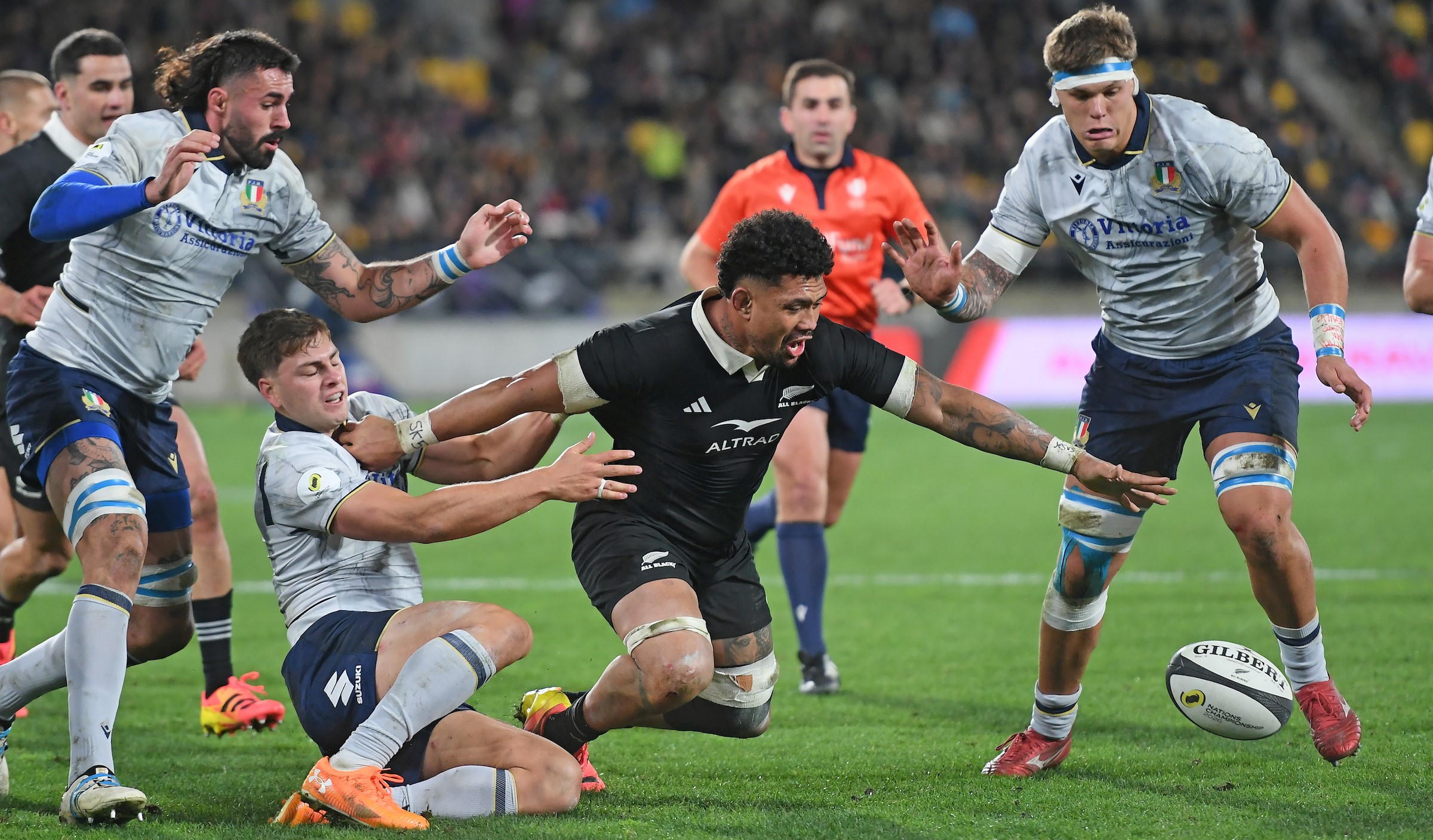 All Blacks skipper Ardie Savea loses the ball against Italy.