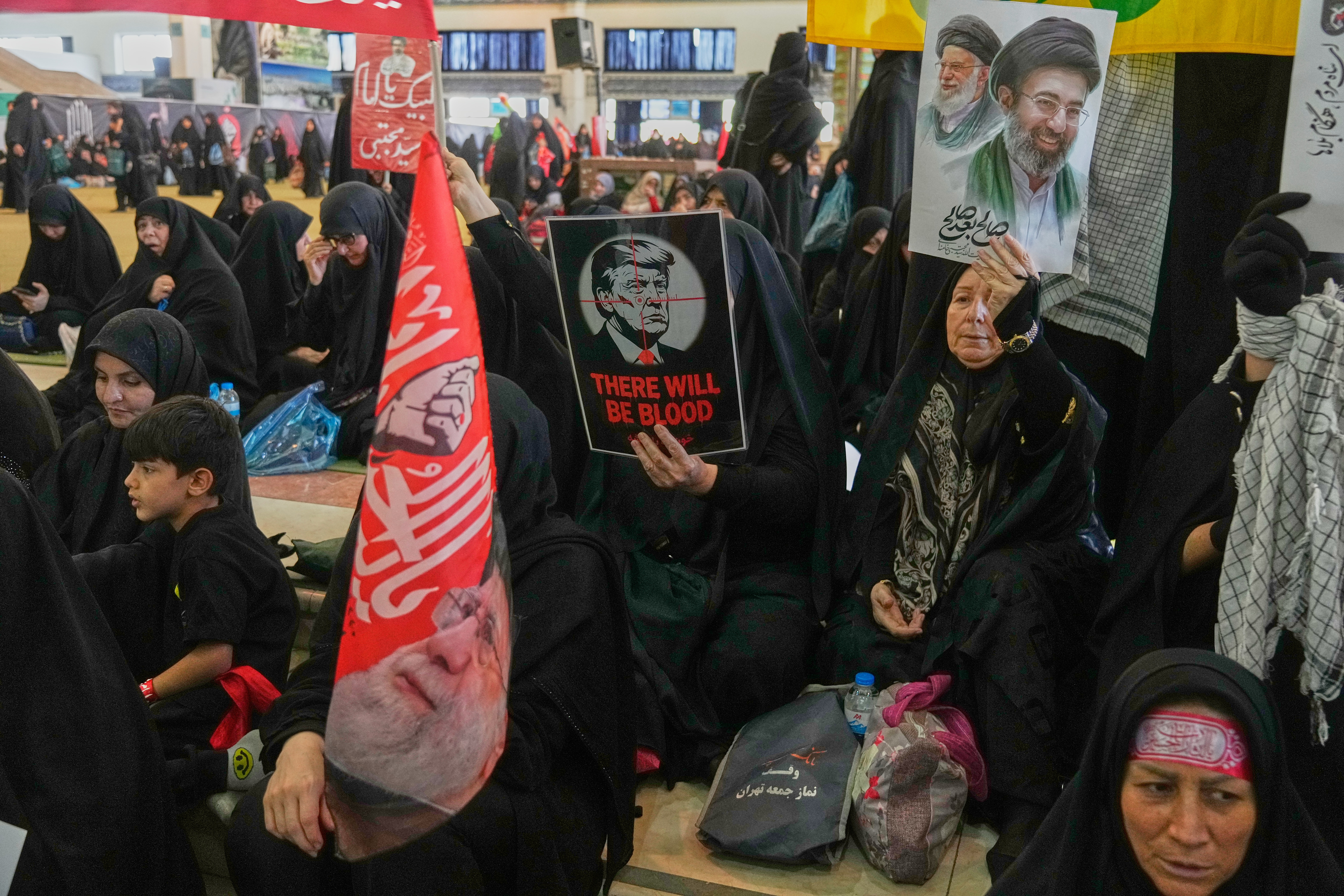 Mourners gather to commemorate the late leader at the Imam Khomeini Mosalla Grand Mosque in Tehran, Iran, Tuesday, July 14, 2026.