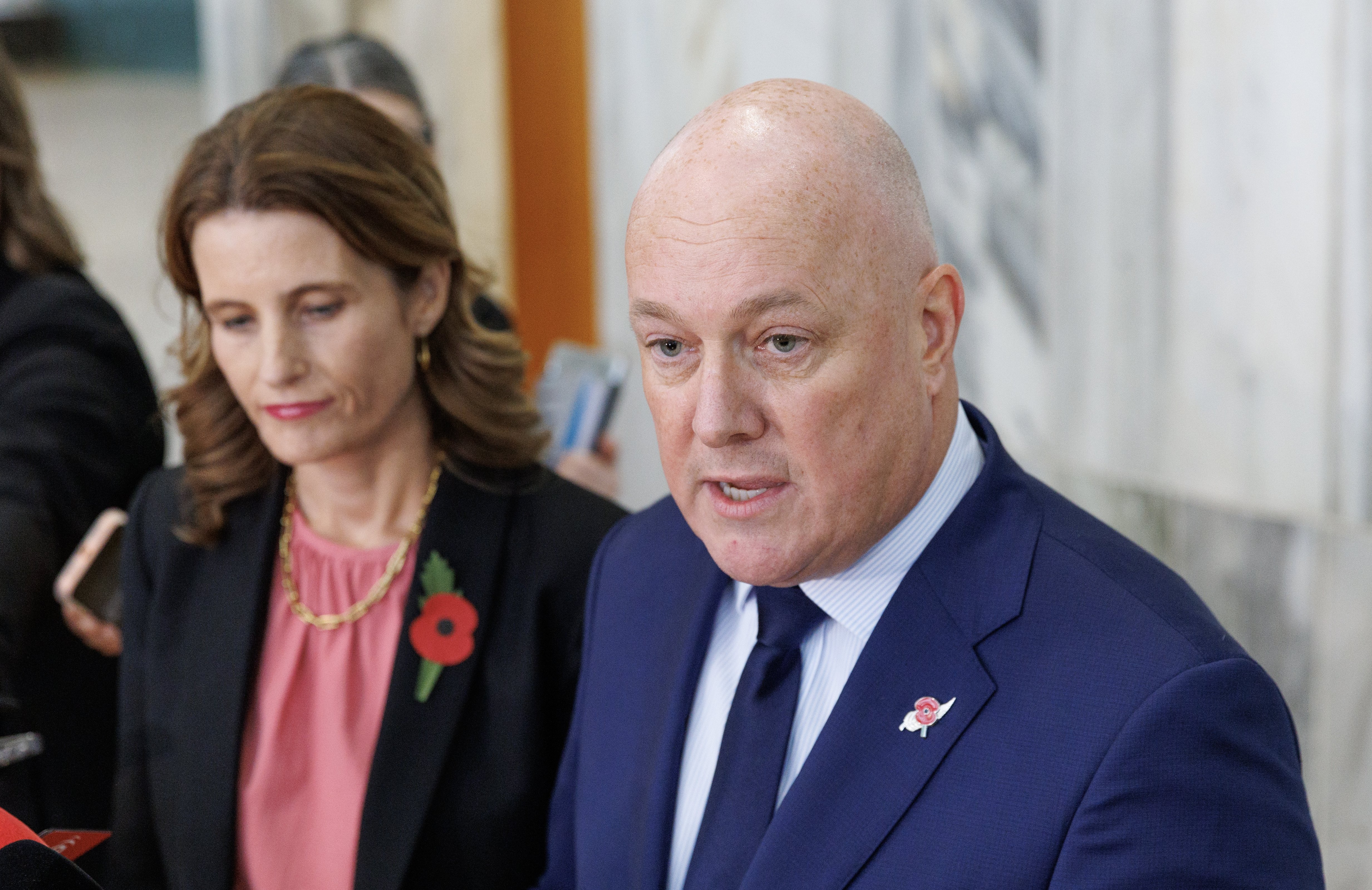 Prime Minister Christopher Luxon reading his statement to media after the National caucus vote