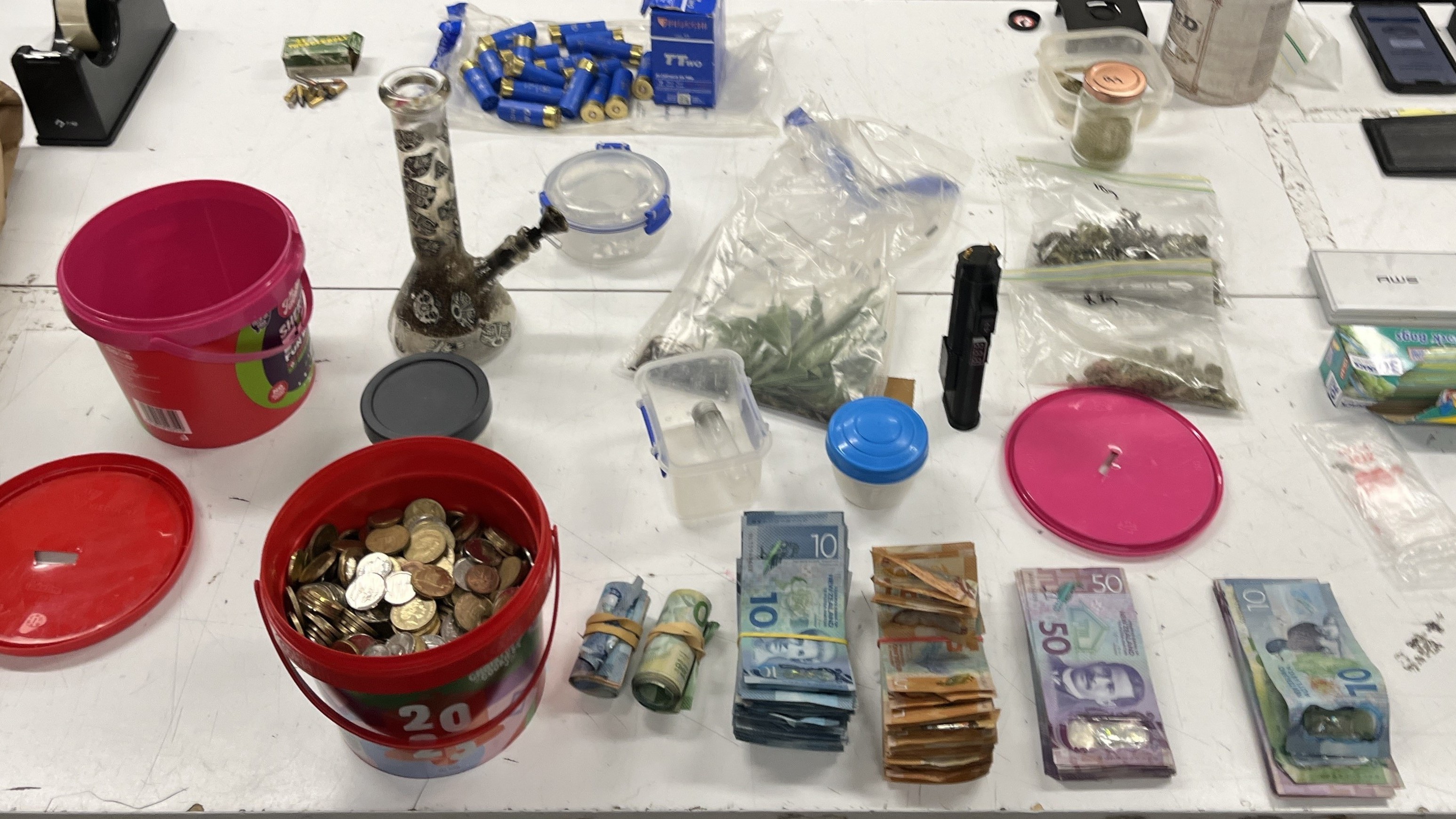 A trove of illicit drugs, ammunition and weapons seized by police in Darfield. (Source: NZ Police)