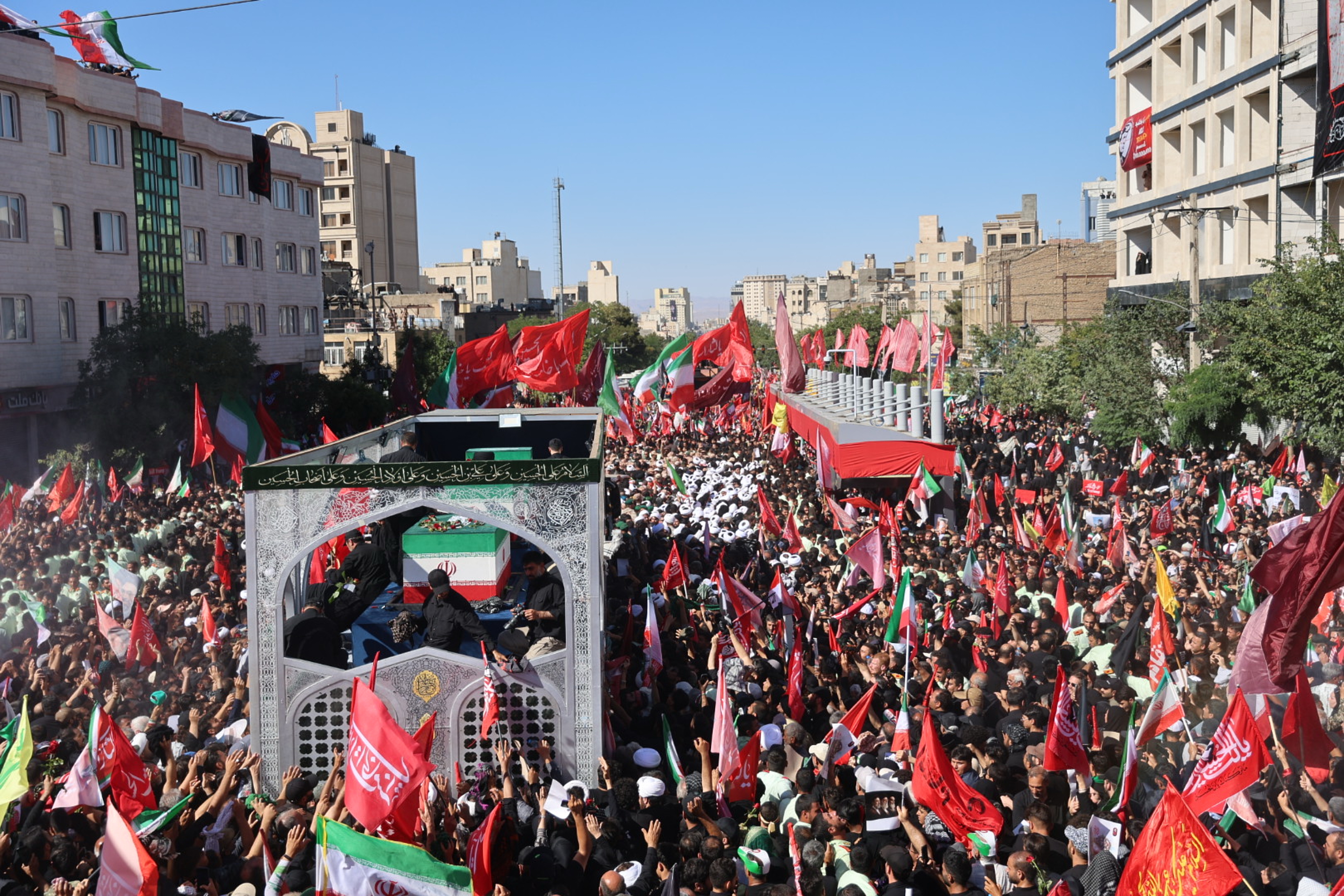 A truck carrying the coffins of the late Iranian Supreme Leader Ayatollah Ali Khamenei.