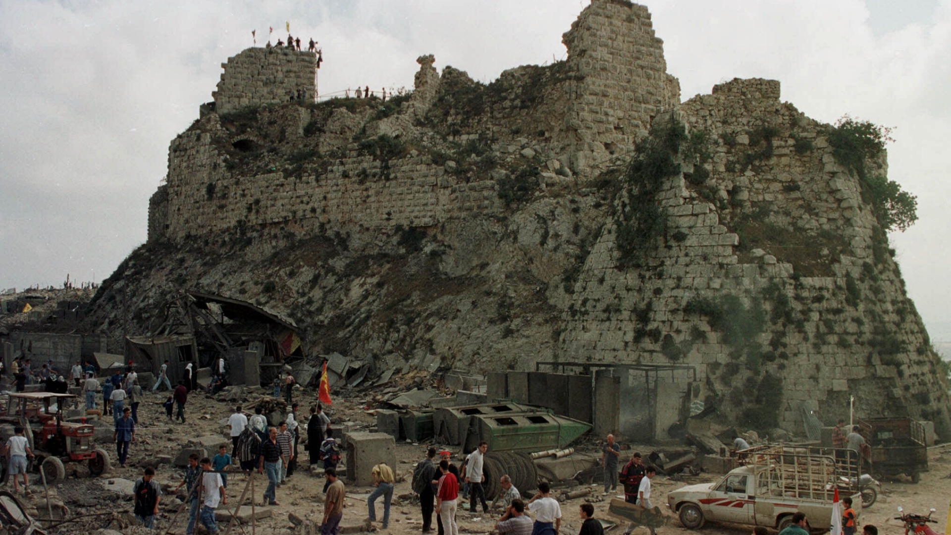 Villagers inspect the damage to Beaufort Castle, 10 km northwest of the southern market town of Nabatiyeh, Lebanon.