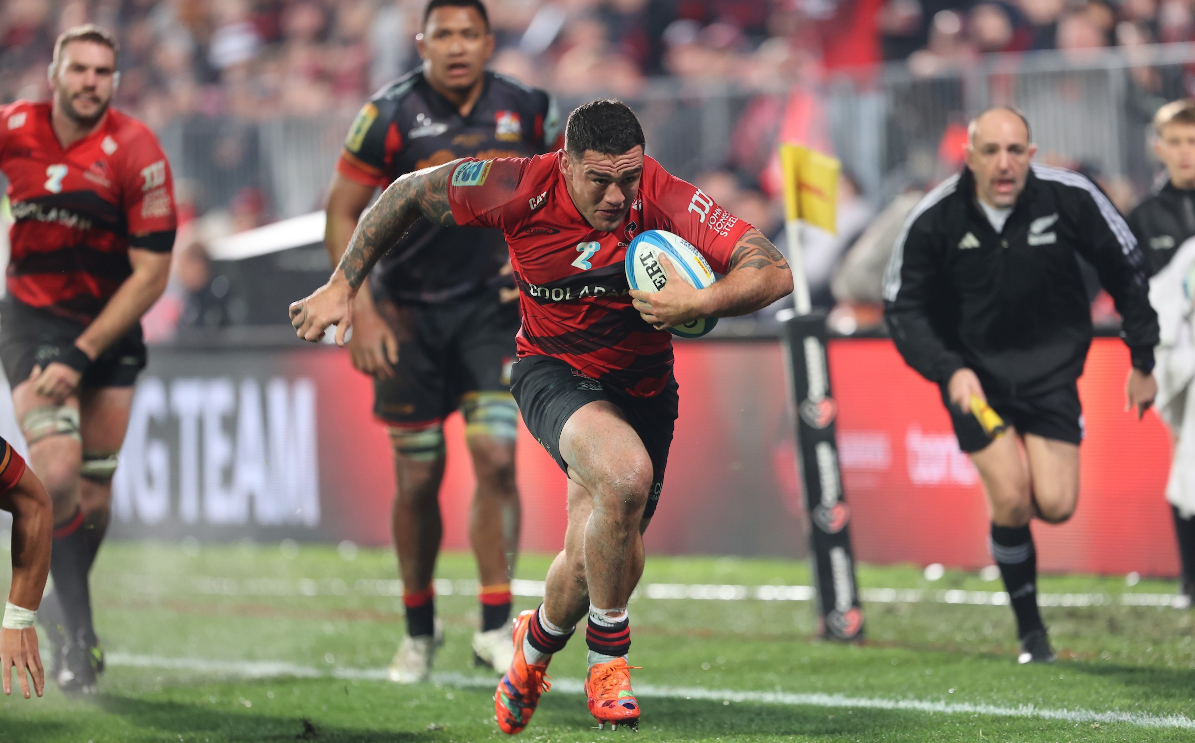 Codie Taylor runs in for his try against the Chiefs.