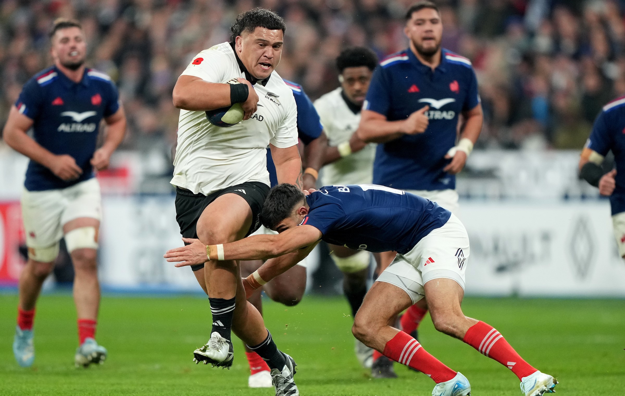 All Blacks prop Tamaiti Williams goes on the attack against France.