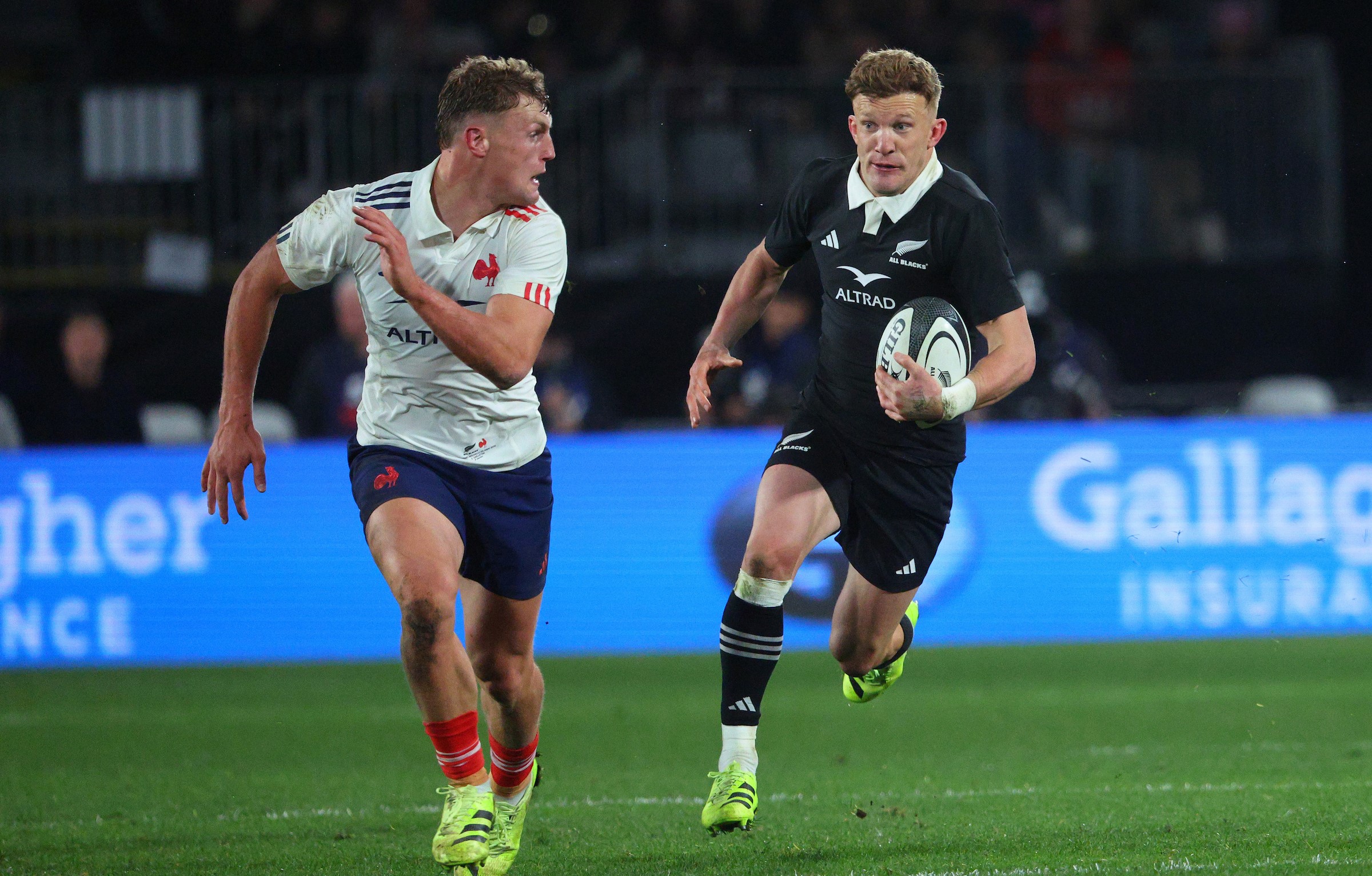 Damian McKenzie keeps the French defence guessing in Dunedin.