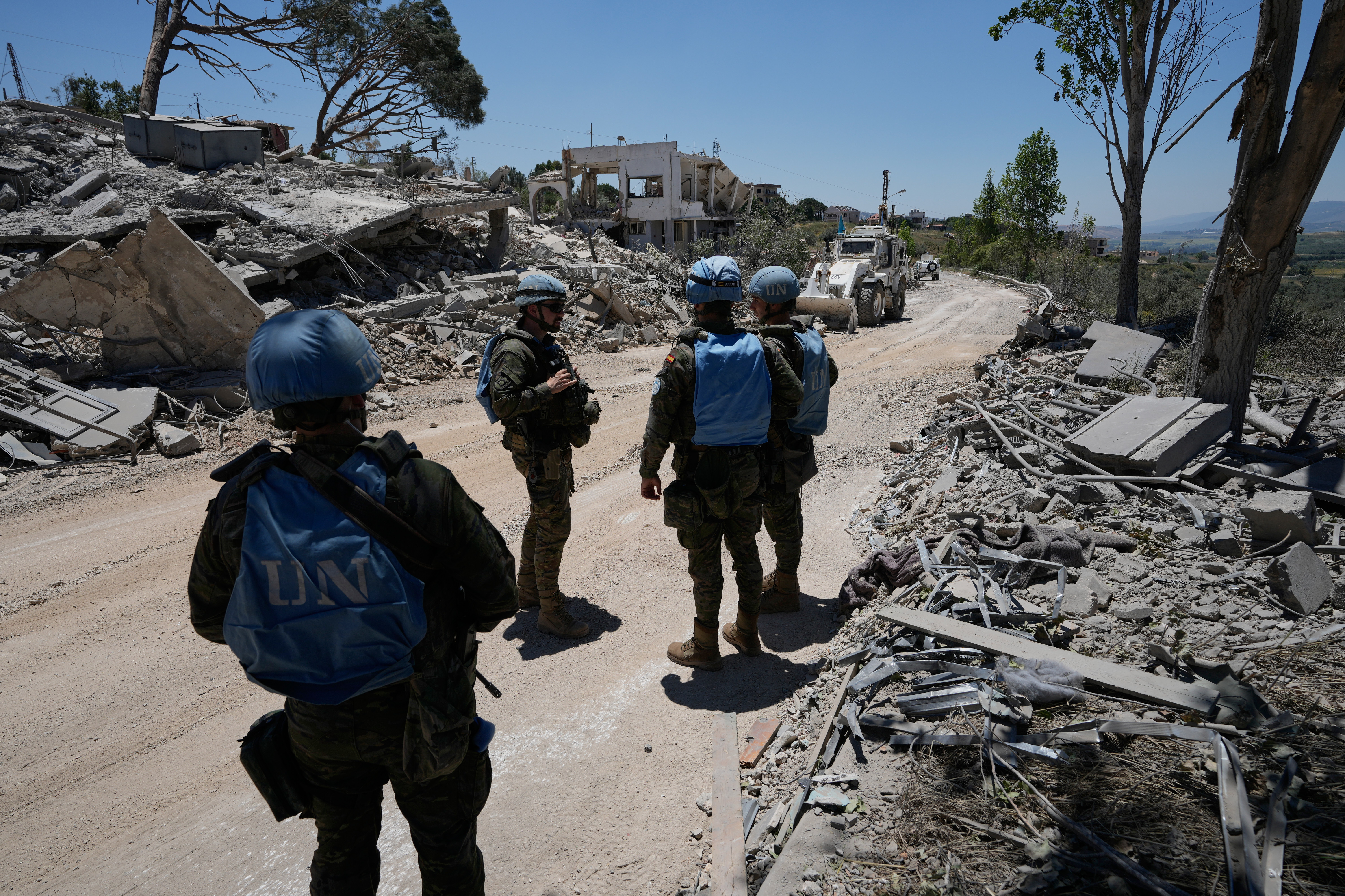 Spanish UN peacekeepers deploy at a road in Dibbine village, southeast Lebanon, Friday, June 5, 2026, a day after Israeli forces withdrew following intense clashes with Hezbollah fighters. 