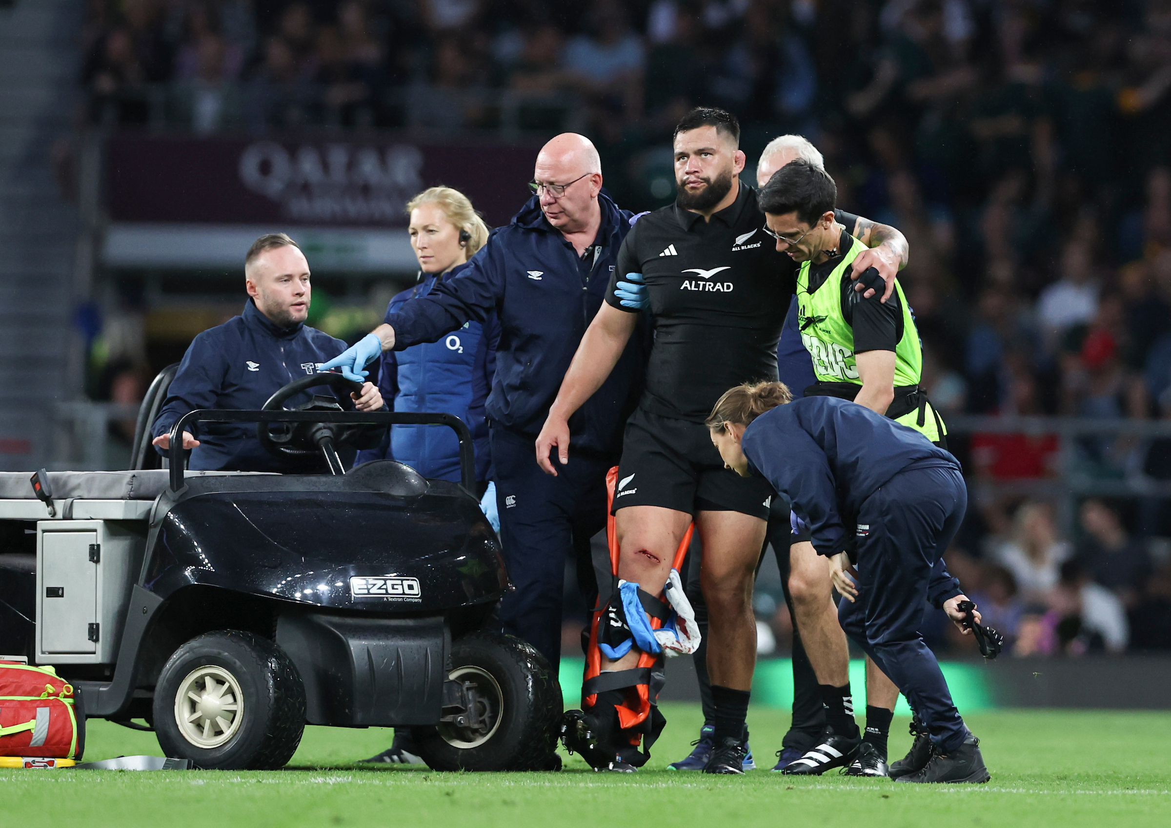 Prop Tyrel Lomax leaves the pitch with a gashed knee.