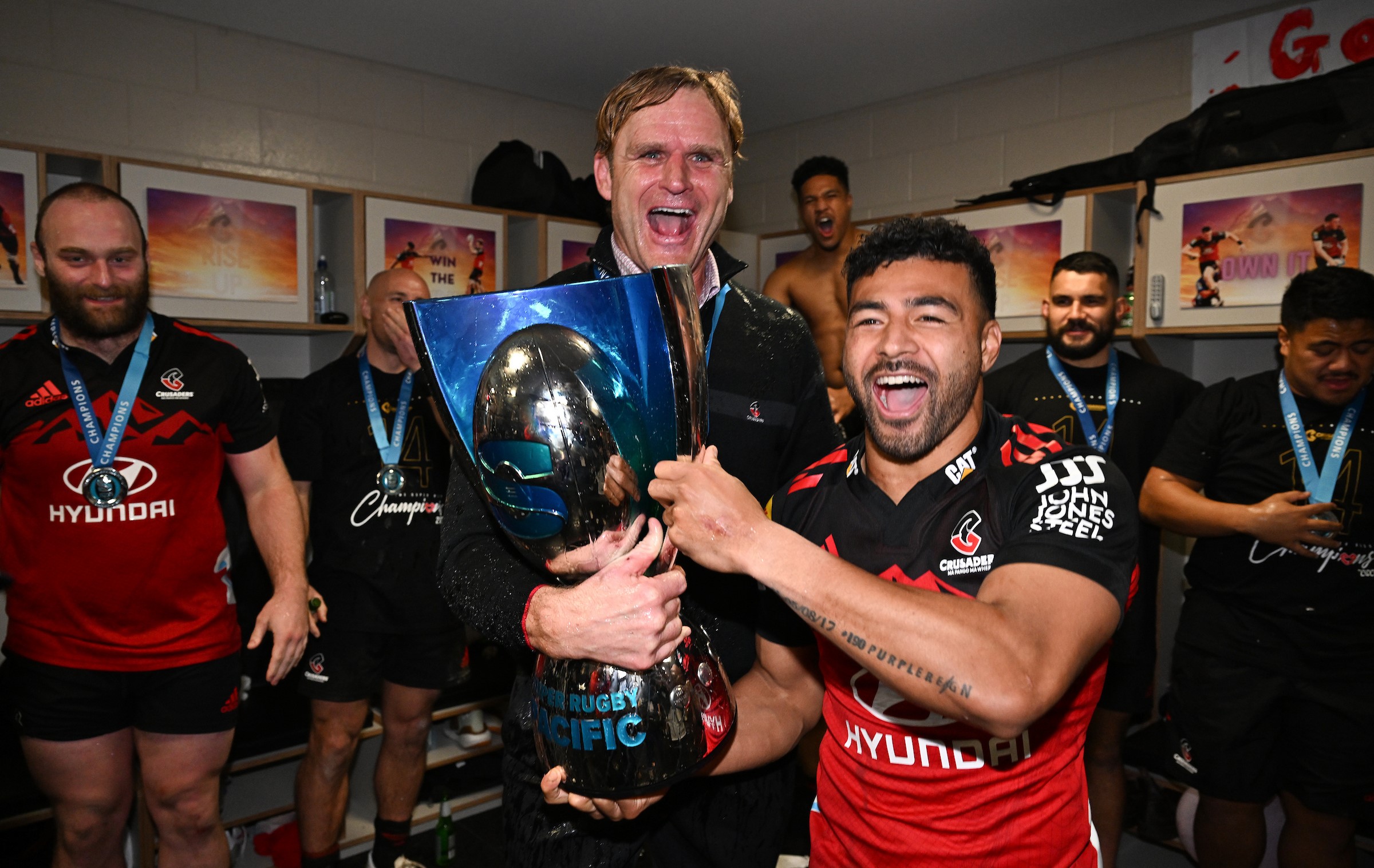 Scott Robertson celebrates leading the Crusaders to their seventh consecutive title alongside Richie Mo'unga in 2023.