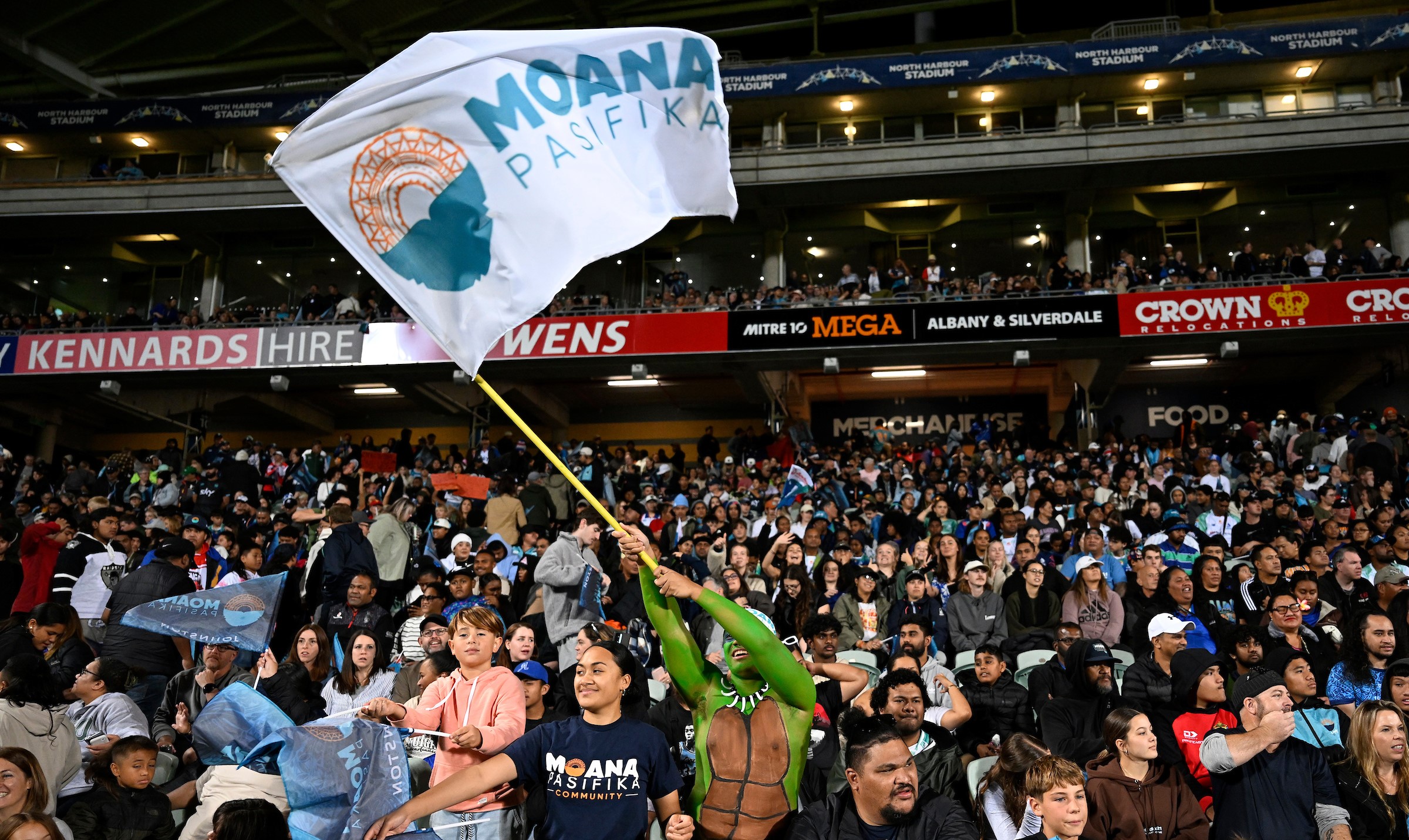 Fans of Moana Pasifika and Fijian Drua celebrate the occasion at North Harbour Stadium yesterday.
