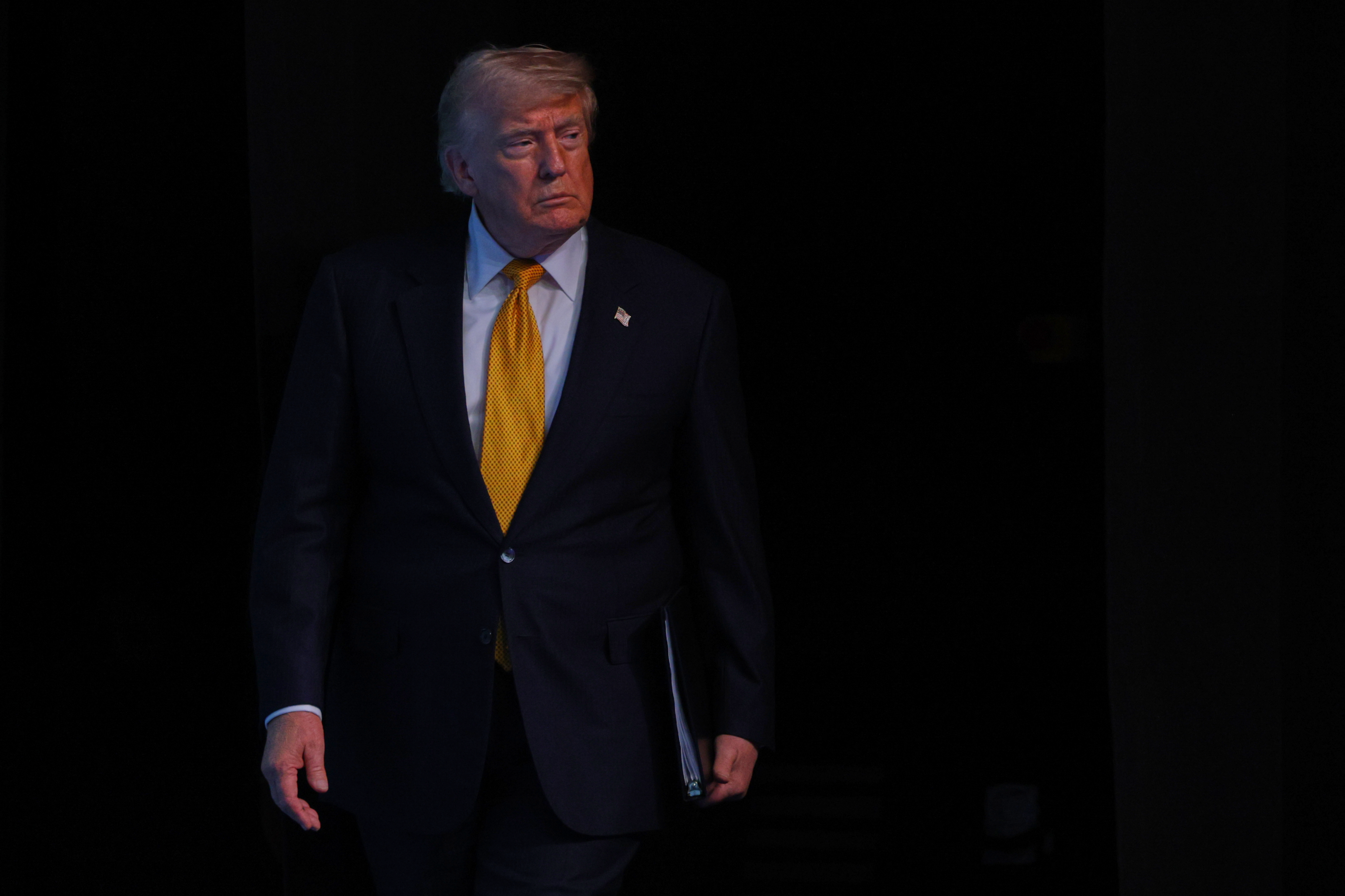 President Donald Trump arrives for a media conference at the NATO summit in Ankara, Turkey.