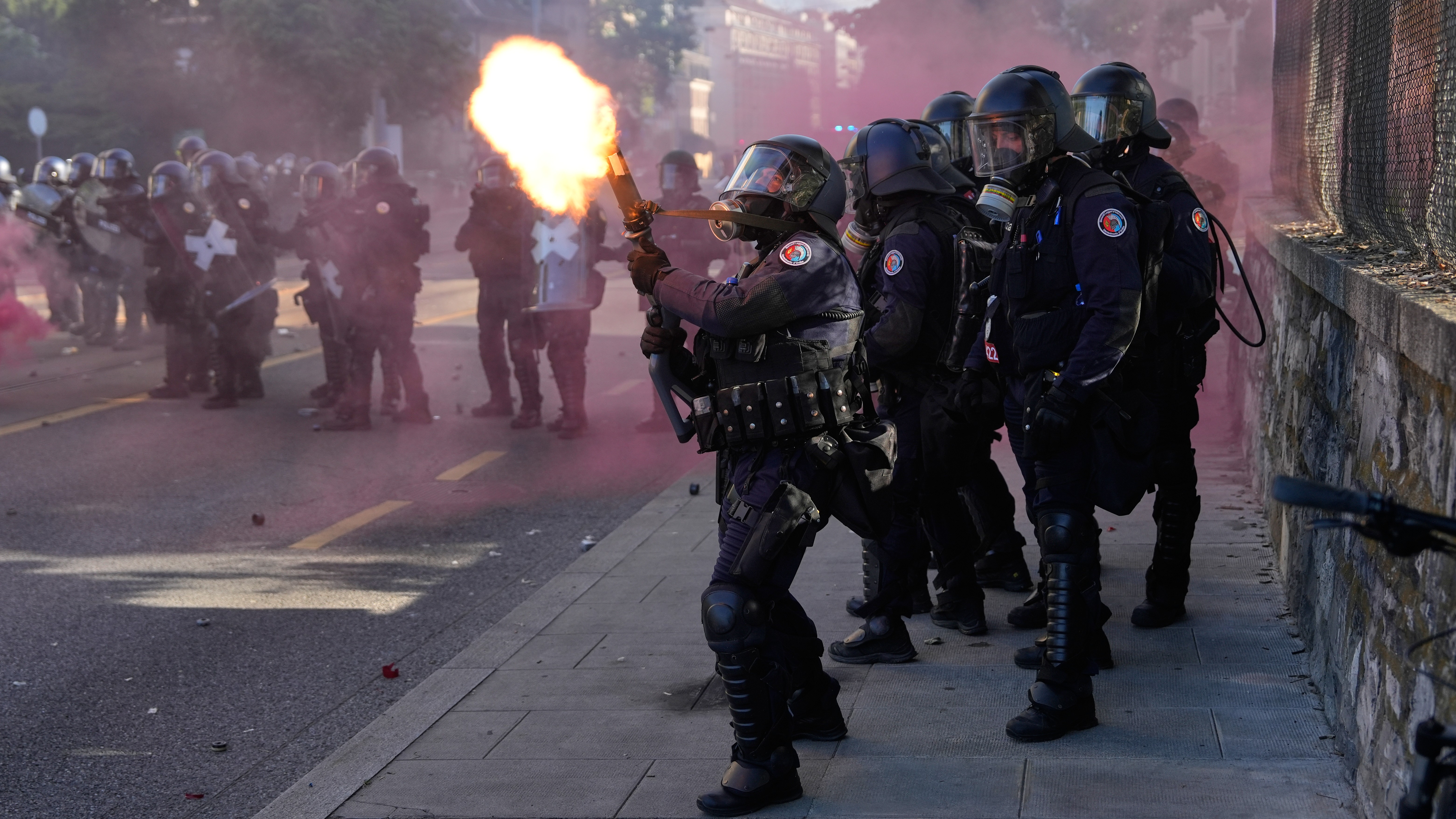 Protestors clash with police in Geneva ahead of the G7 summit in nearby France.