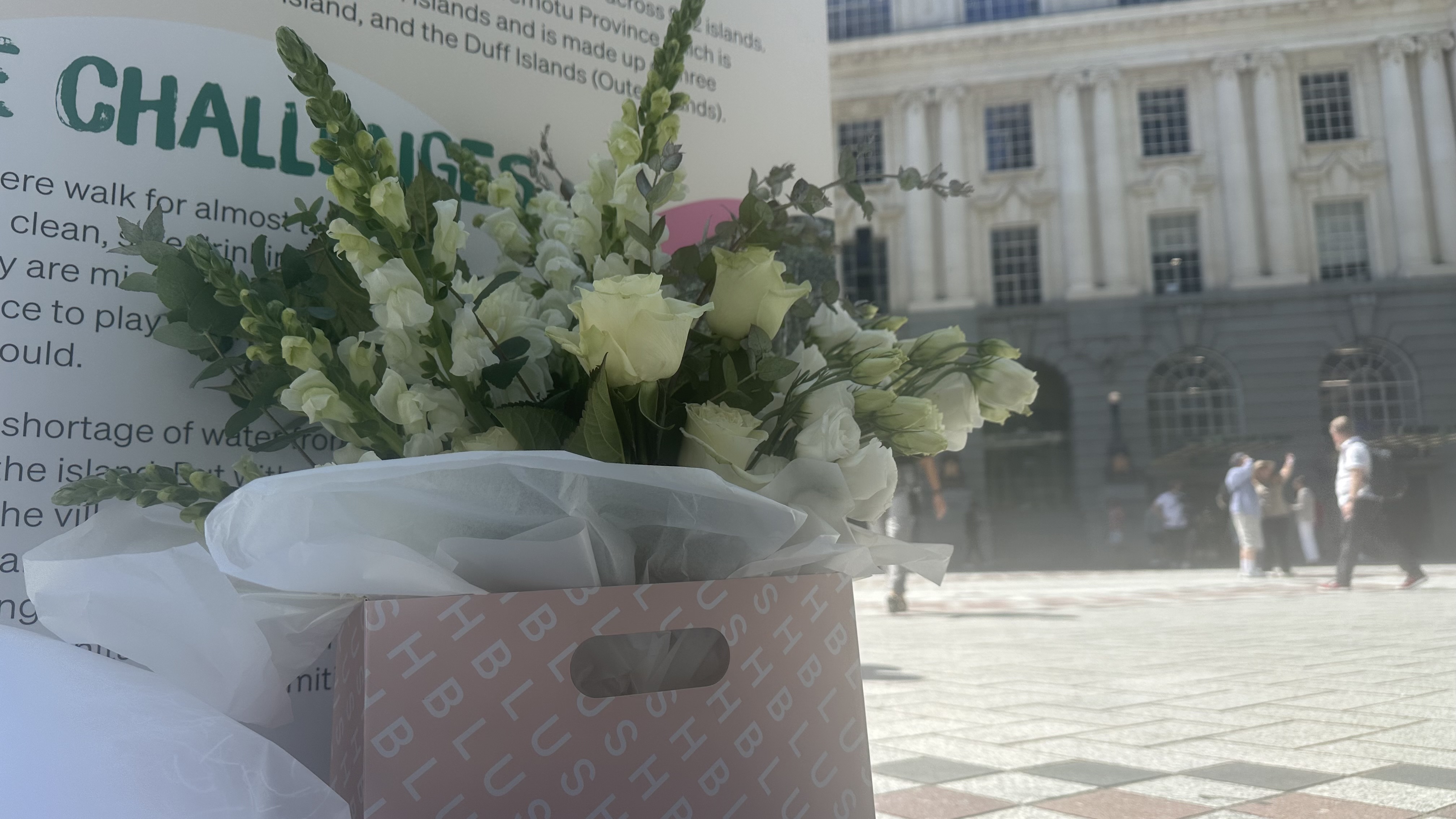 People have started to lay flowers at the scene of the charity event where Efeso Collins died.