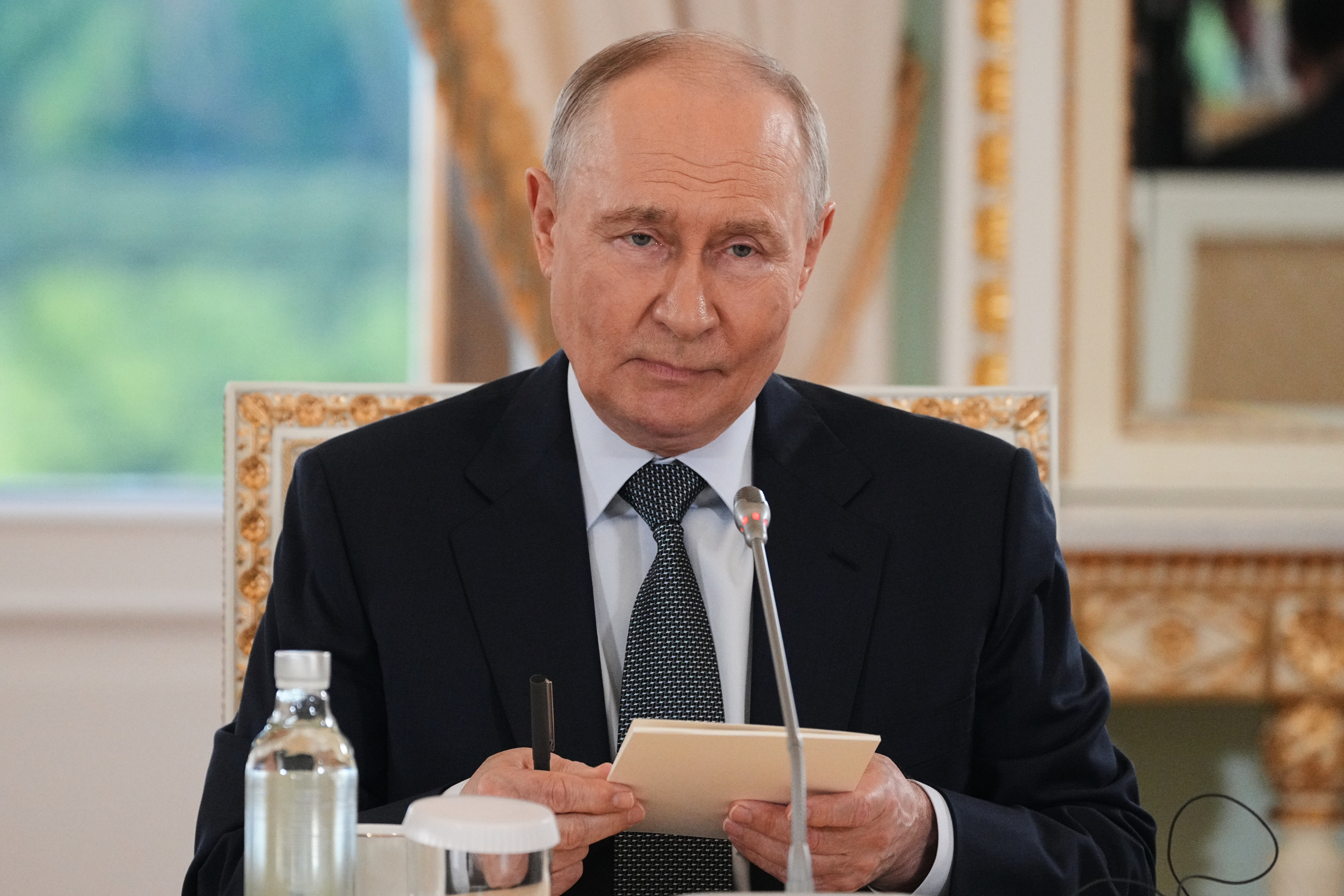 Russian President Vladimir Putin meets with representatives of international news agencies on the sidelines of the St. Petersburg International Economic Forum at the Constantine Palace in St. Petersburg, Russia, on Thursday, June 4, 2026.