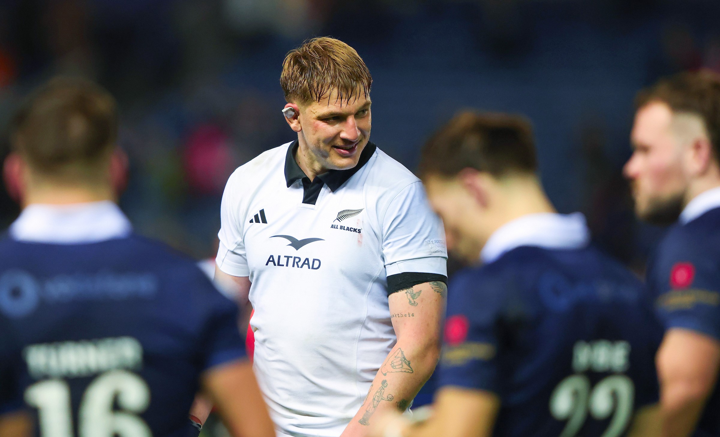 Fabian Holland celebrates the fulltime whistle after the All Blacks beat Scotland at Murrayfield.