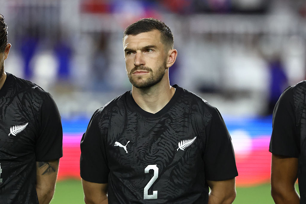 New Zealand defender Tim Payne (2) stands for the national anthem with the starters before the soccer match between Haiti and New Zealand