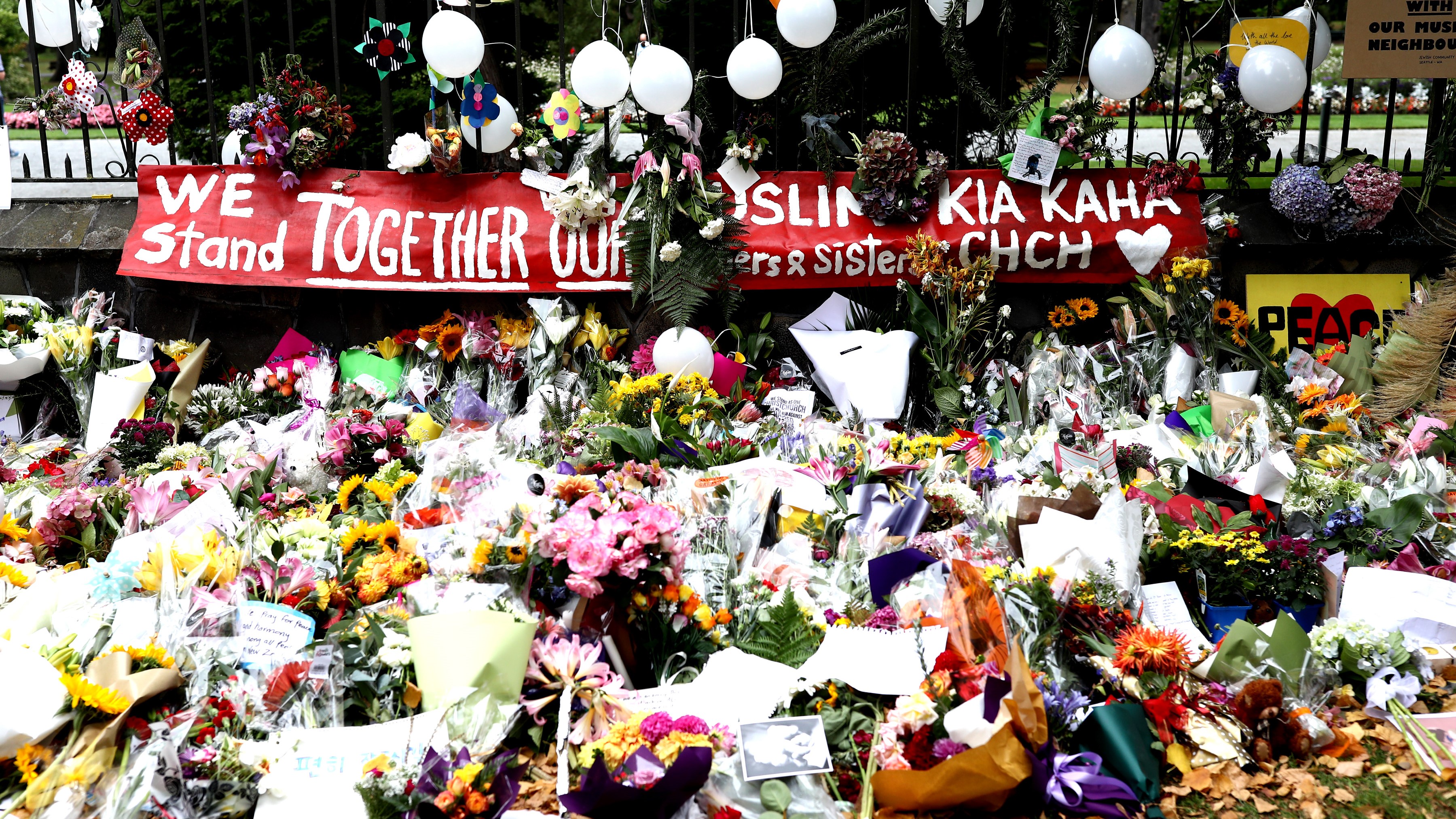 Flowers and tributes are laid at the Botanic Gardens on March 18, 2019.